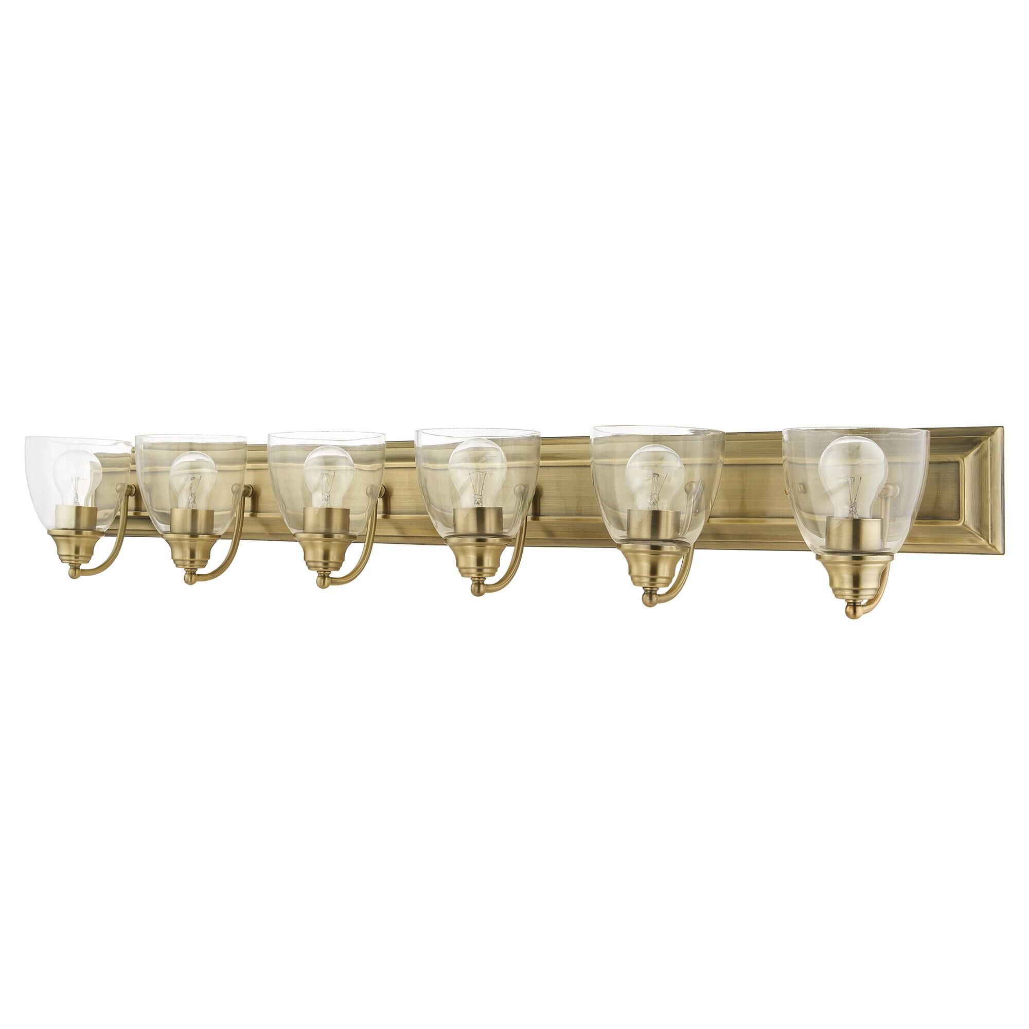 Shown in Antique Brass finish and Hand Blown Clear glass