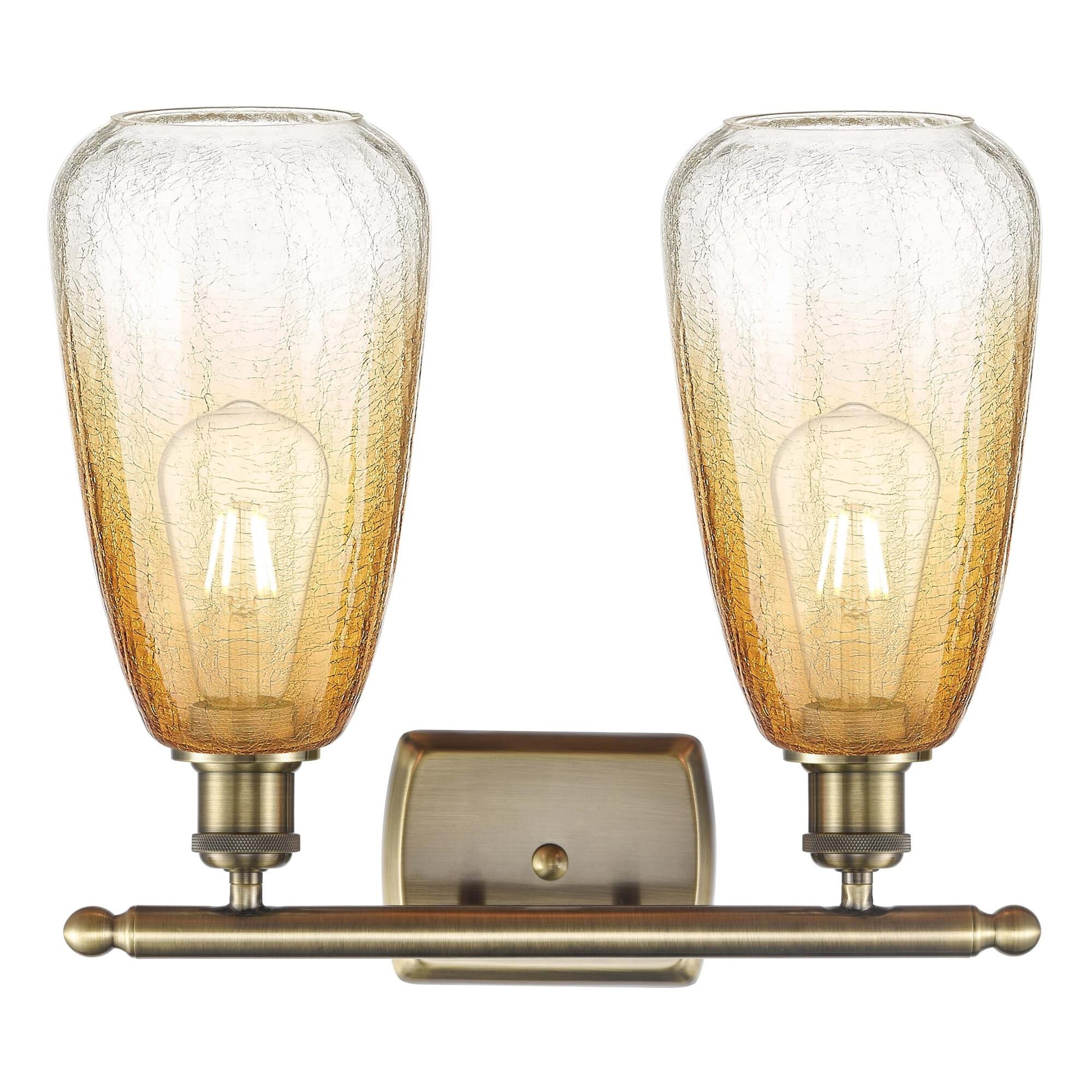 Shown in Antique Brass finish and Amber glass