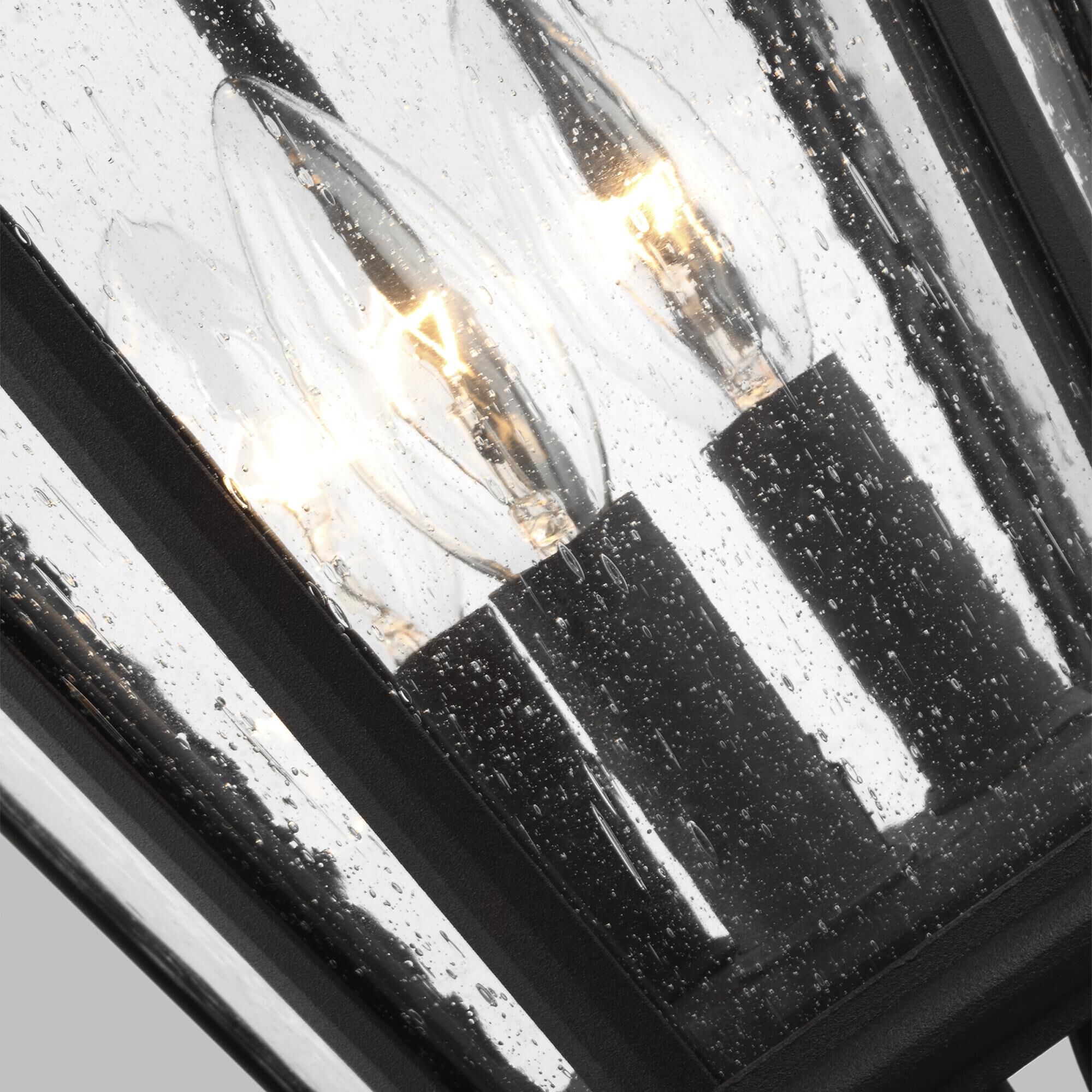 Shown in Black finish and Clear Seeded Panels glass