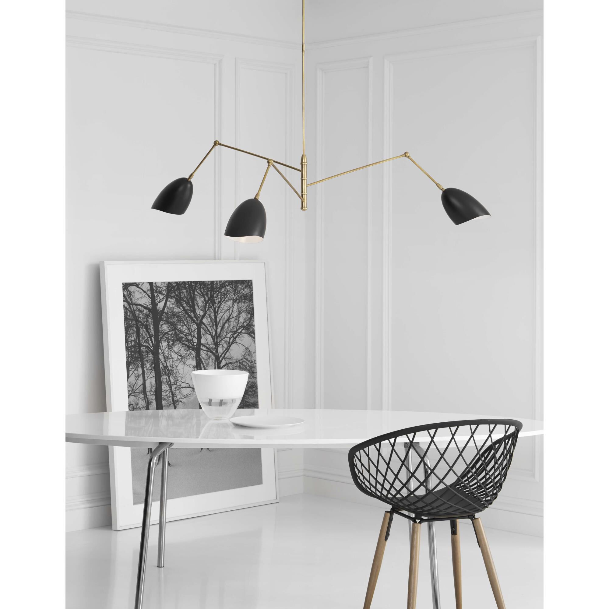 Shown in Hand-Rubbed Antique Brass finish and Black shade