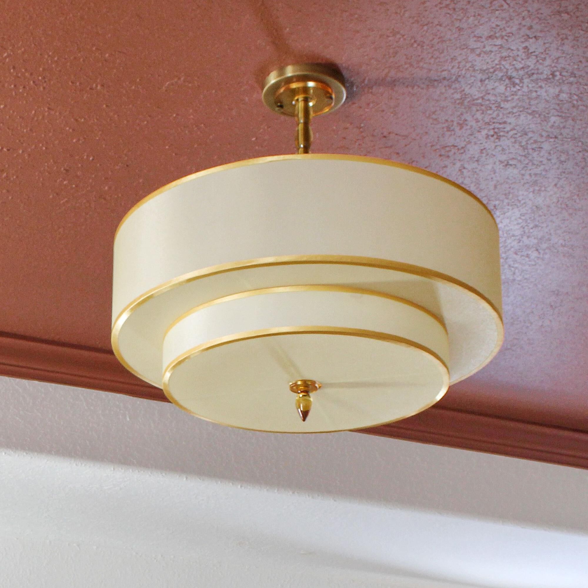 Shown in Antique Brass finish and Organza glass and Organza shade