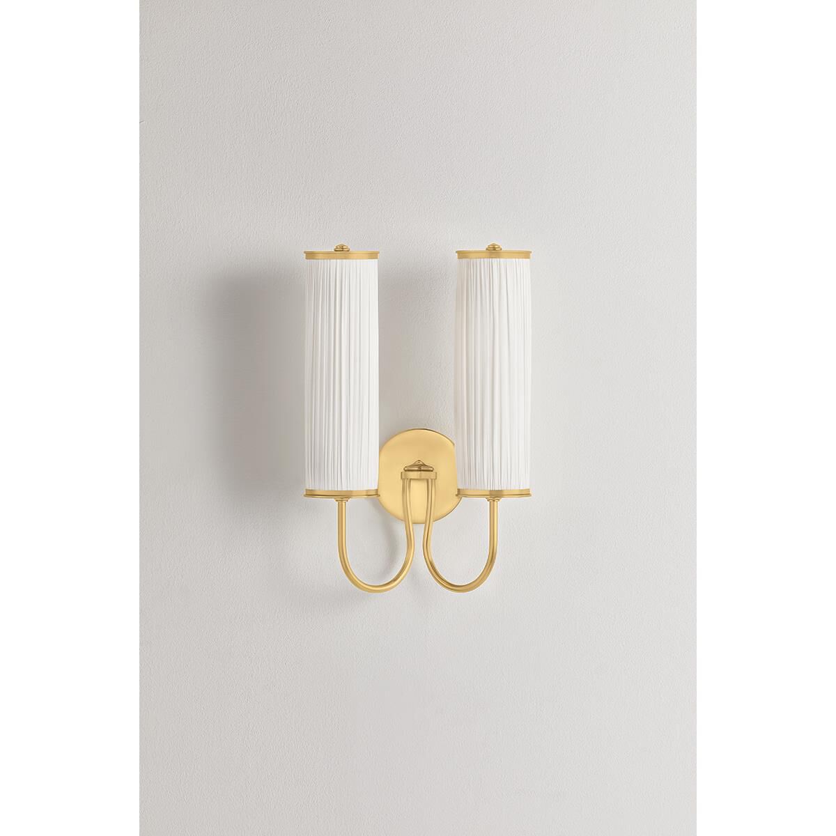 Shown in Aged Brass finish and Ivory Silk shade