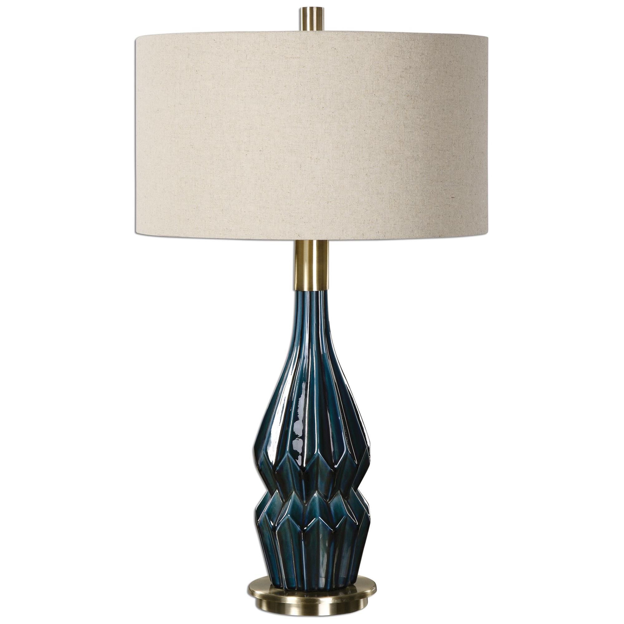 Shown in Plate Brushed Brass finish and Oatmeal Linen shade and Deep Blue accent