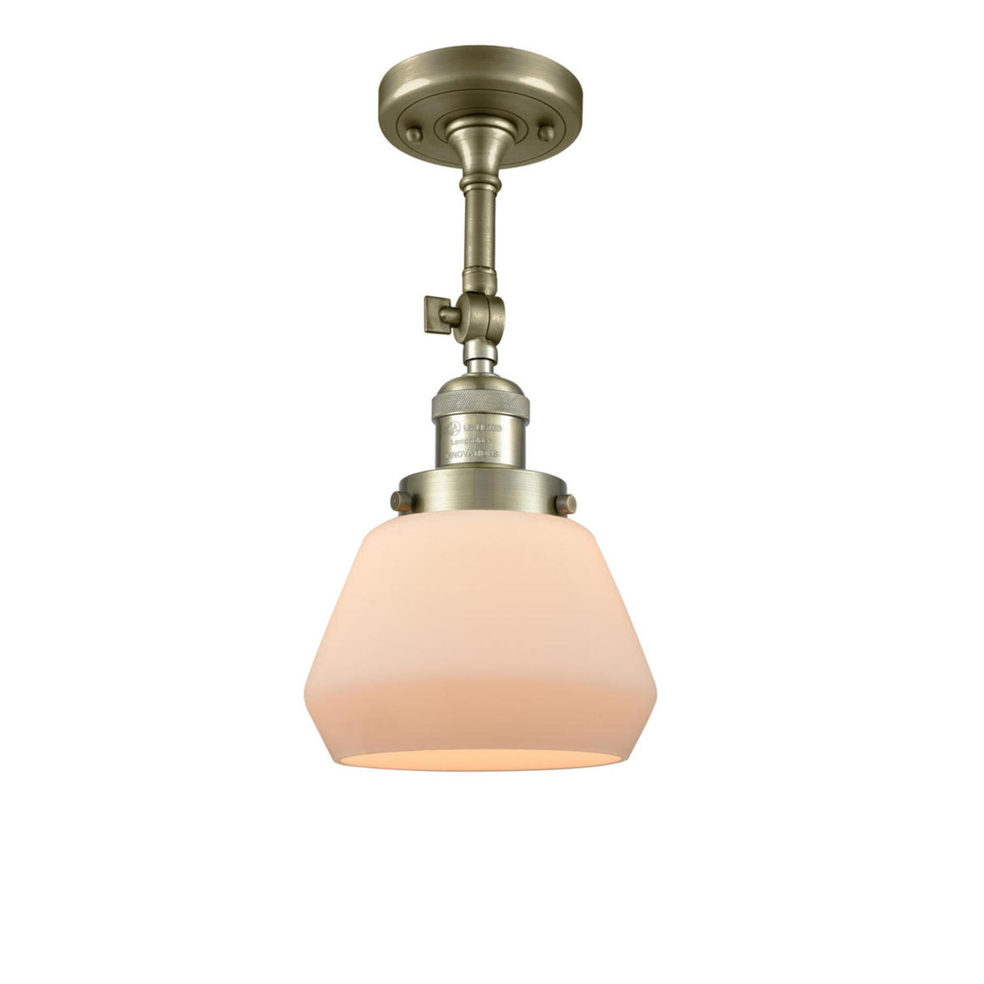 Shown in Antique Brass finish and Matte White Cased glass and No Accent accent