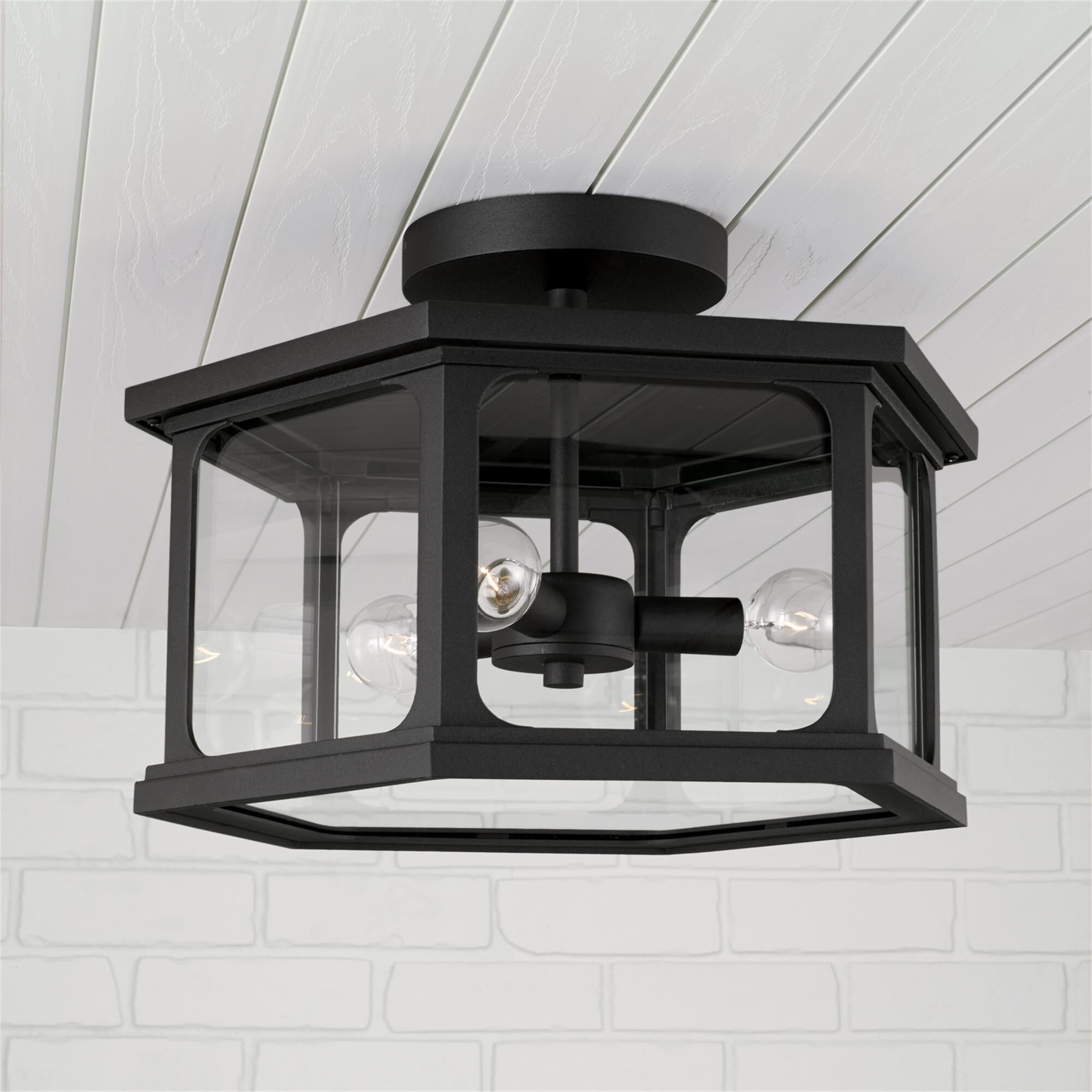 Shown in Black finish and Clear glass