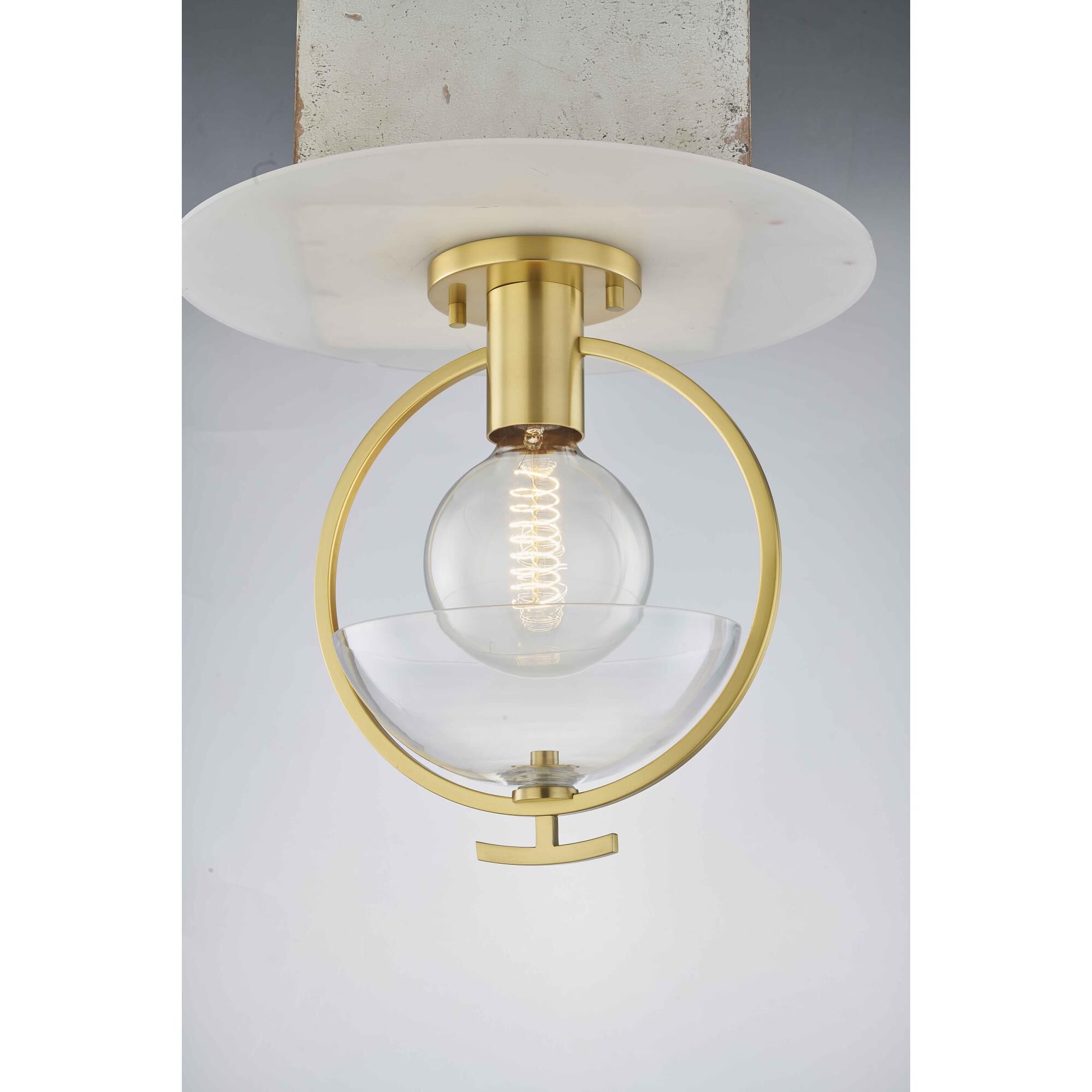 Shown in Aged Brass finish and Clear glass