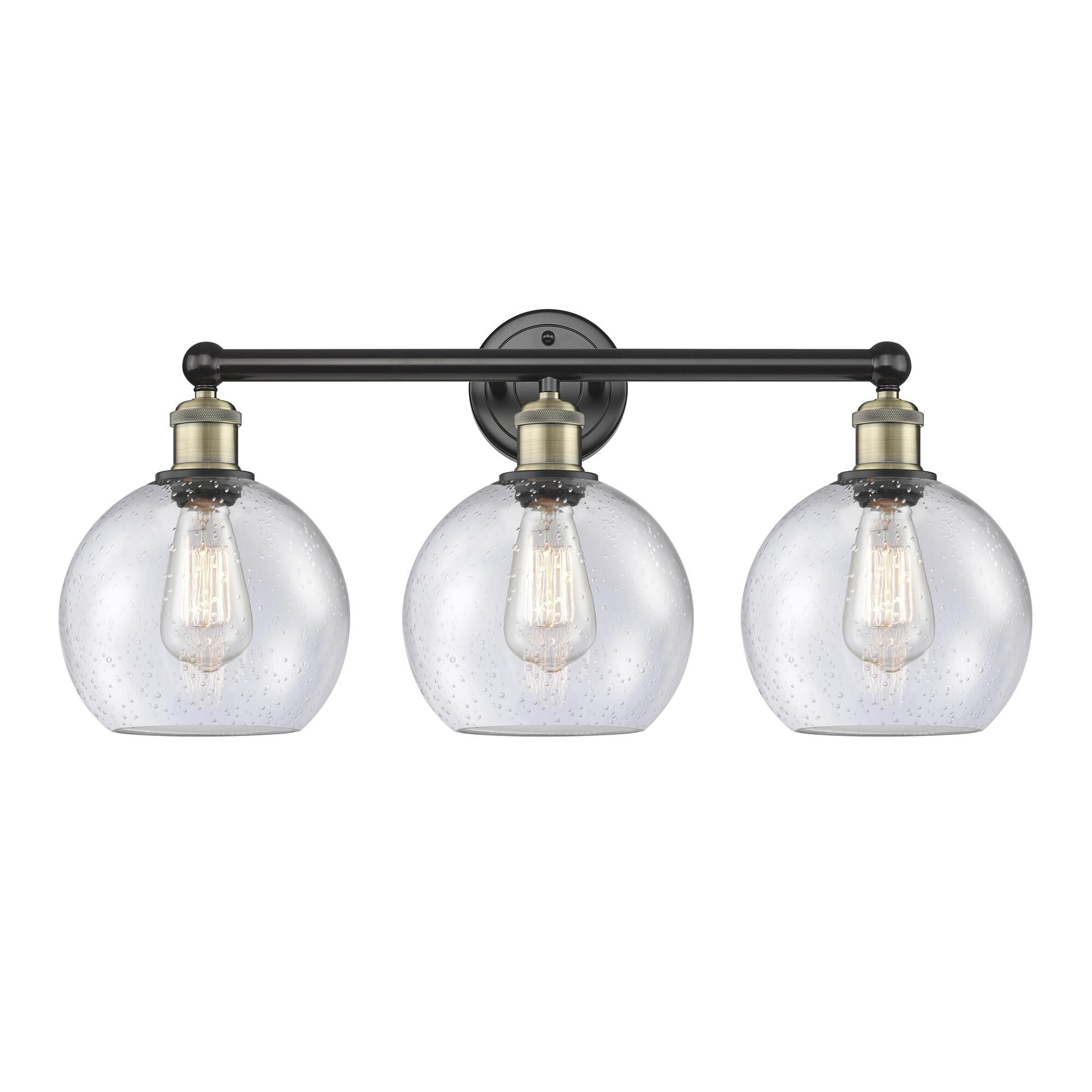 Shown in Black Antique Brass finish and Seedy glass