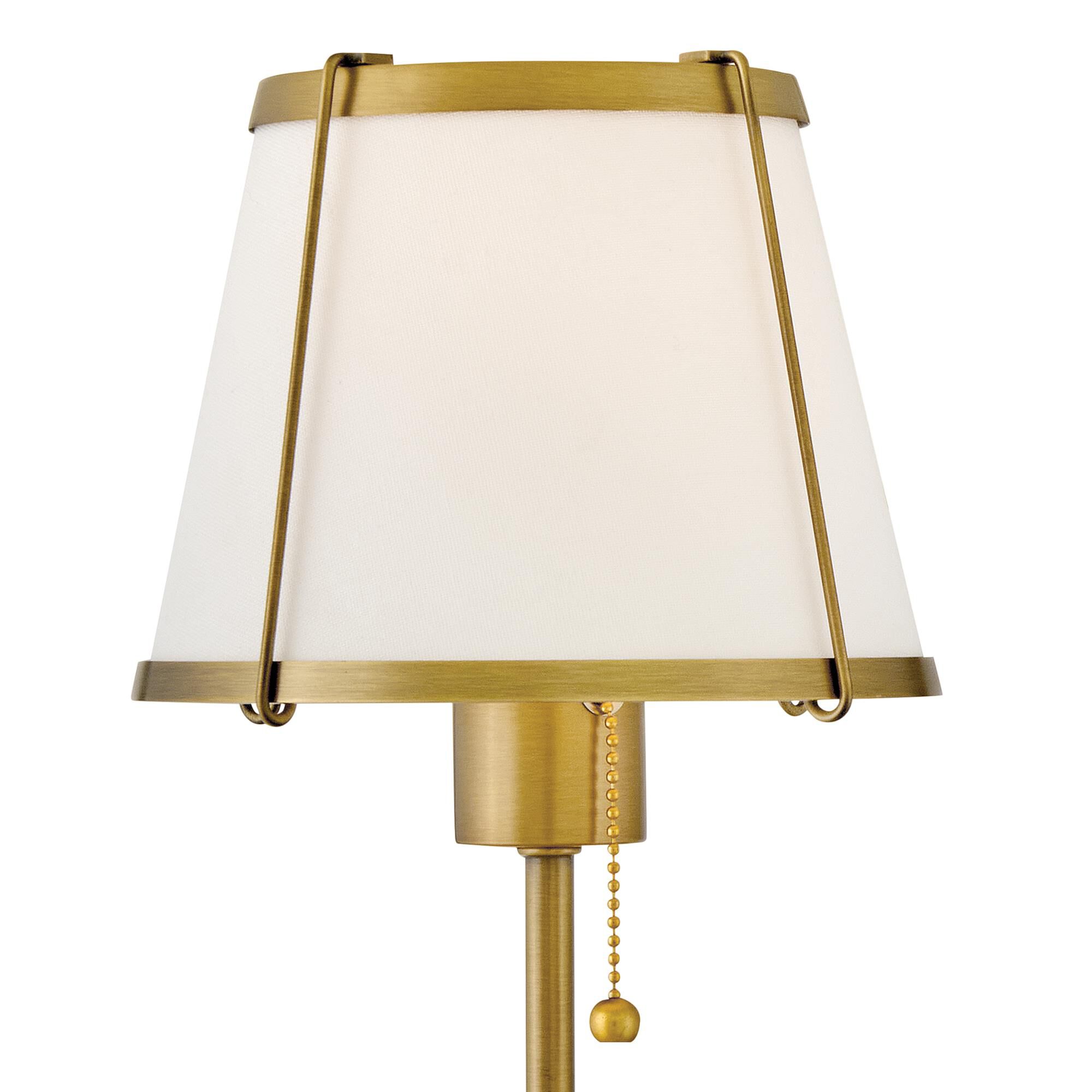 Shown in Lacquered Dark Brass finish and Off-White Linen shade