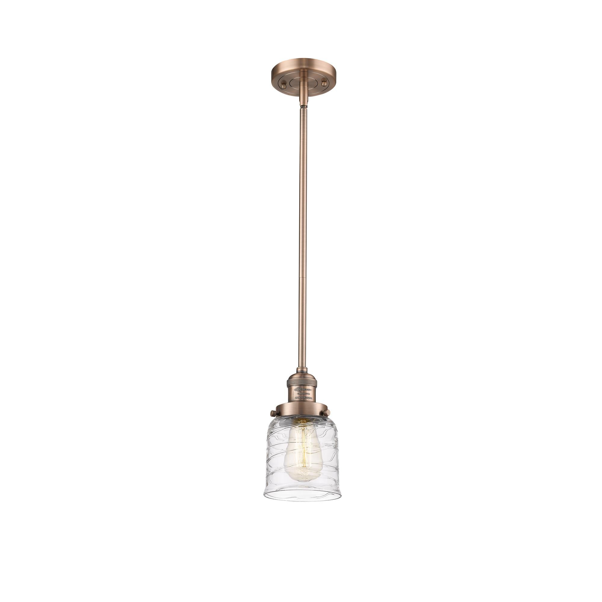 Shown in Antique Copper finish and Deco Swirl glass