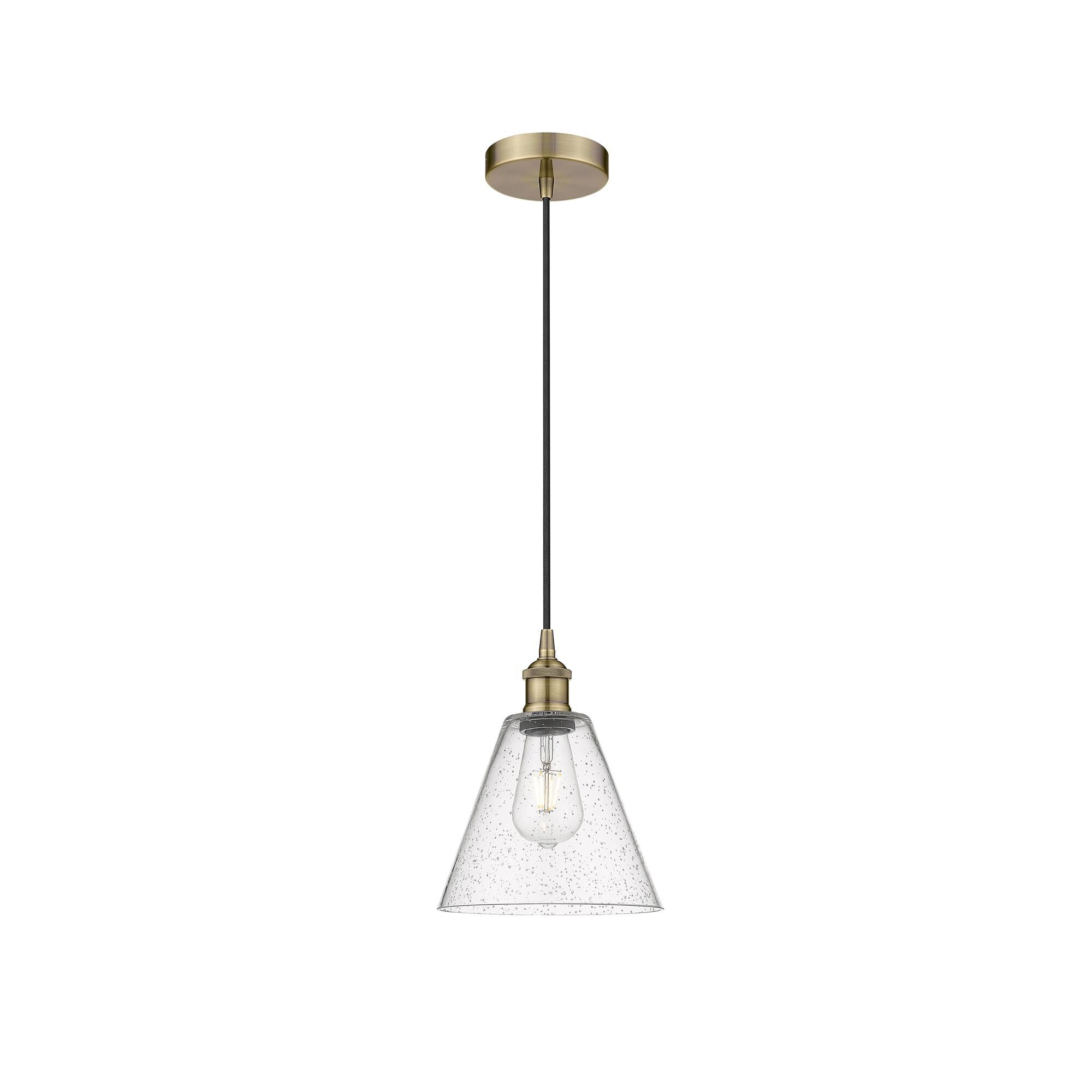 Shown in Antique Brass finish and Seedy glass