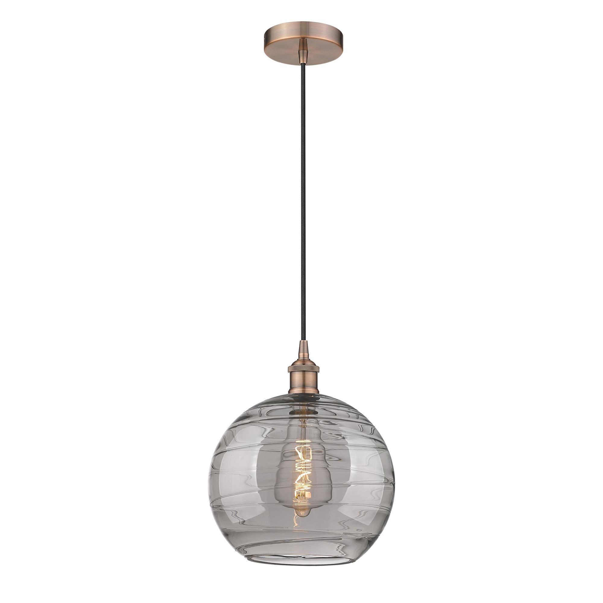 Shown in Antique Copper finish and Light Smoke Deco Swirl glass