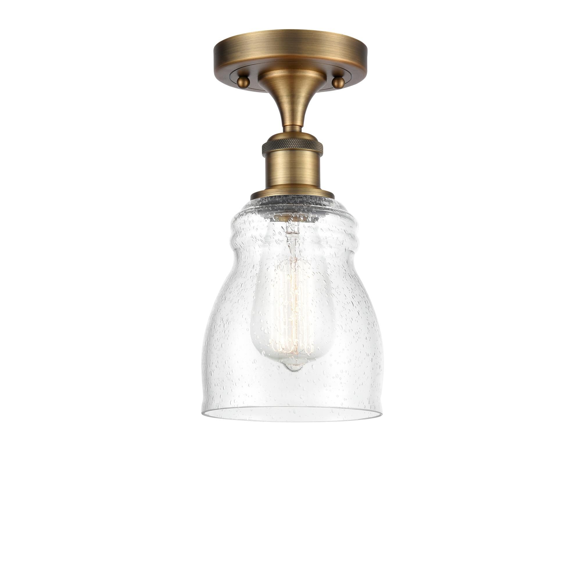 Shown in Brushed Brass finish and Bell glass and Glass shade