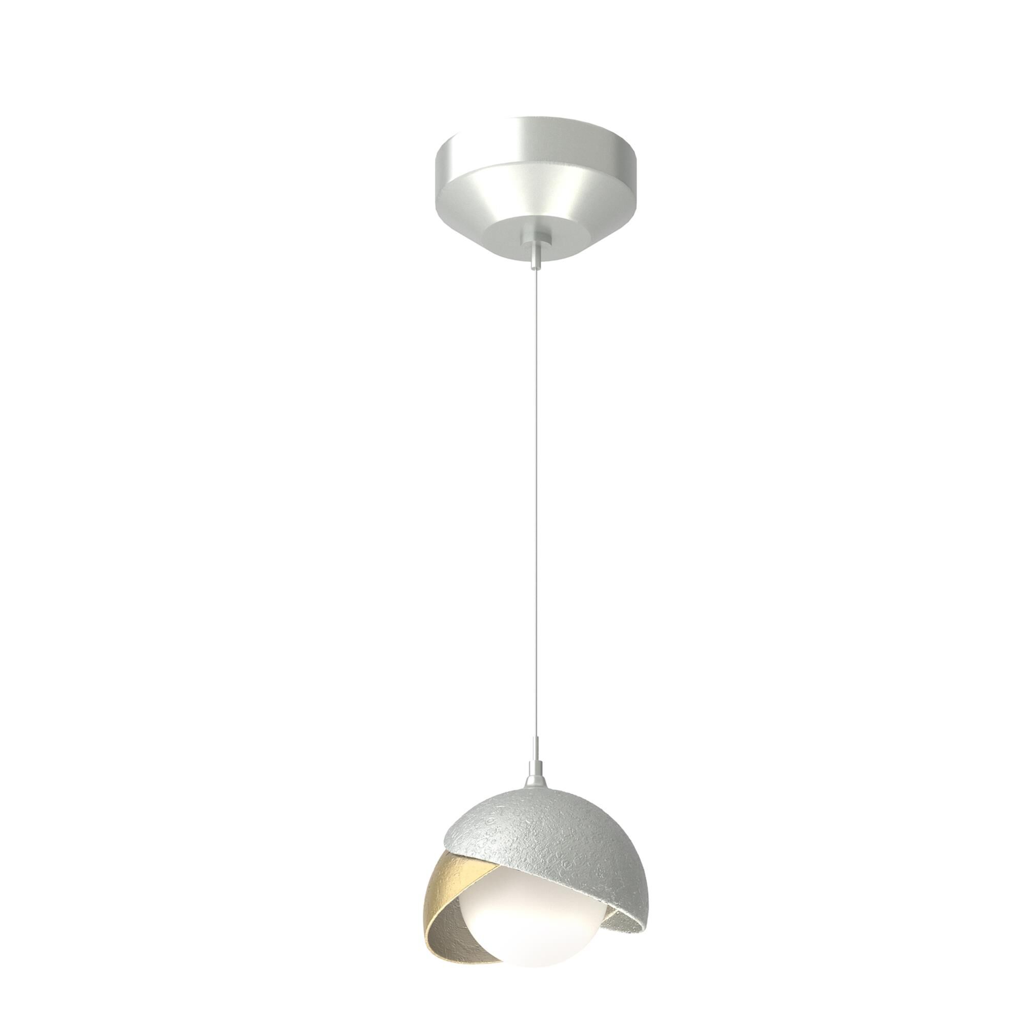 Shown in Vintage Platinum finish and Opal glass and Modern Brass  accent