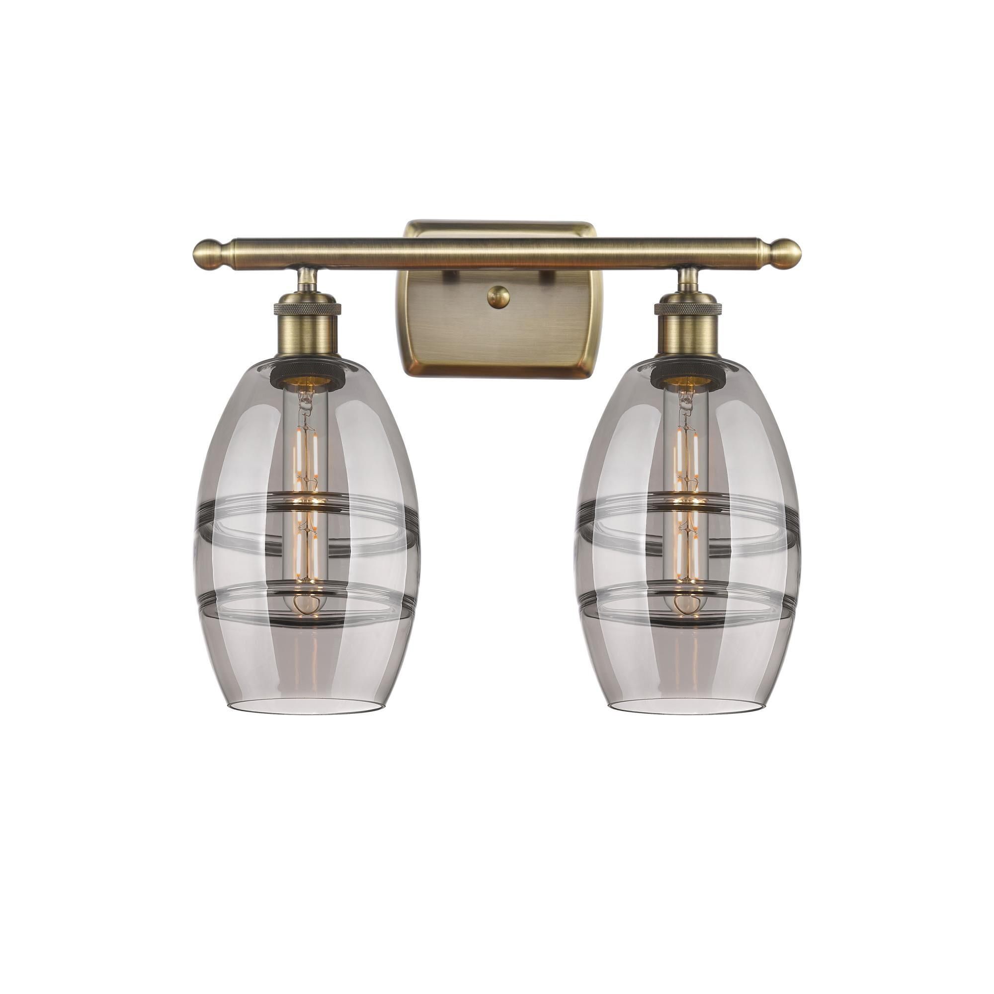 Shown in Antique Brass finish and Light Smoke glass