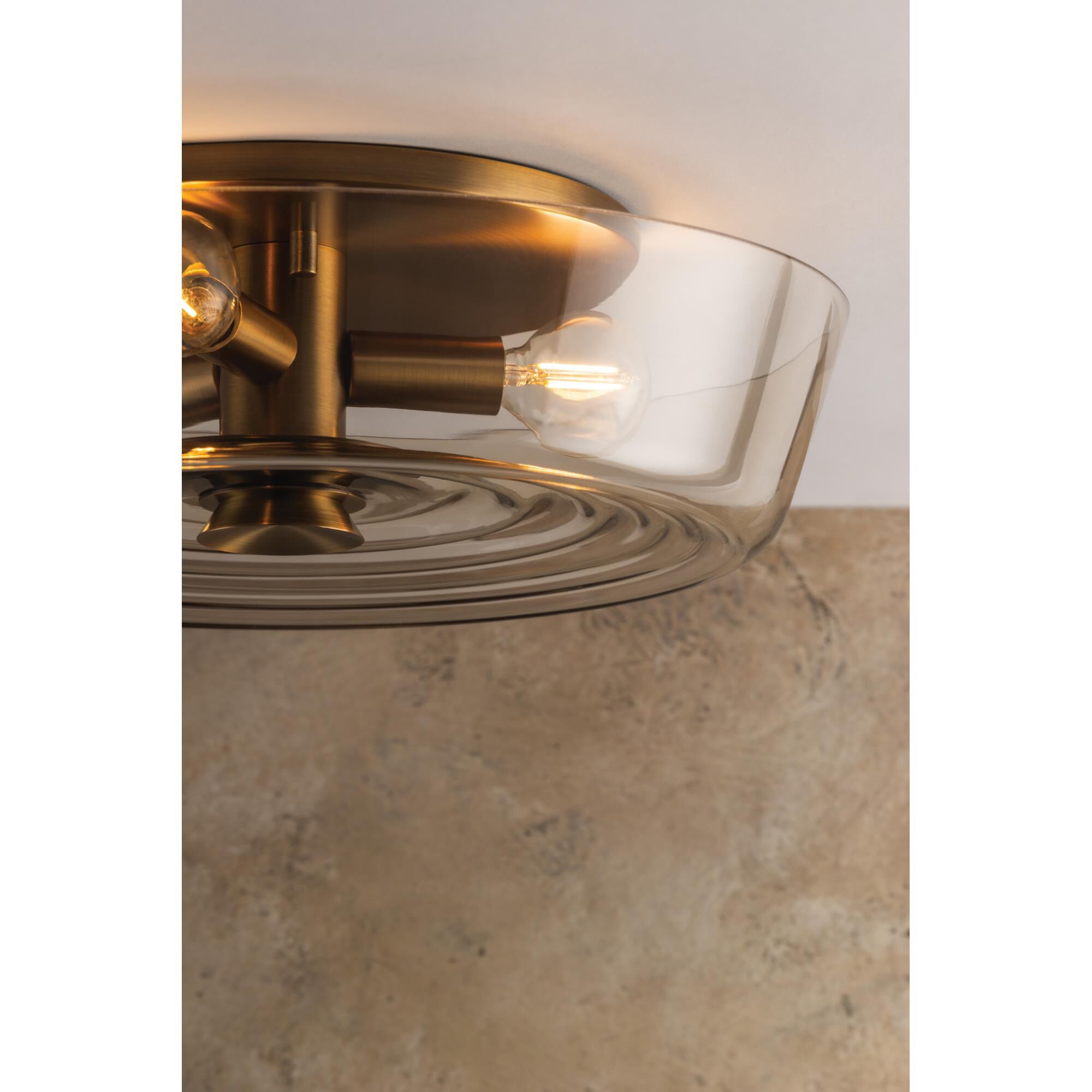 Shown in Patina Brass finish and Light Bronze shade