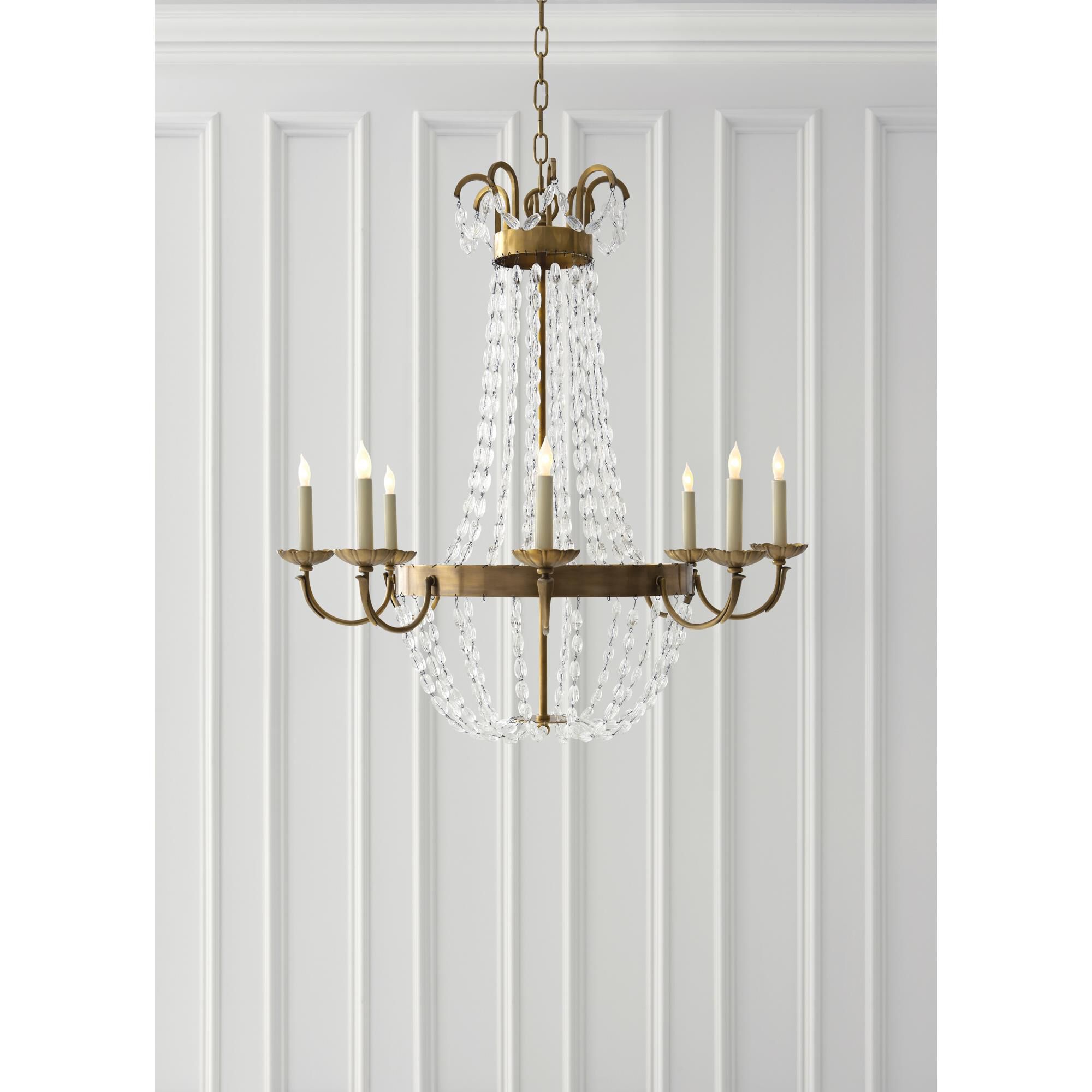 Shown in Antique-Burnished Brass finish and Seeded glass