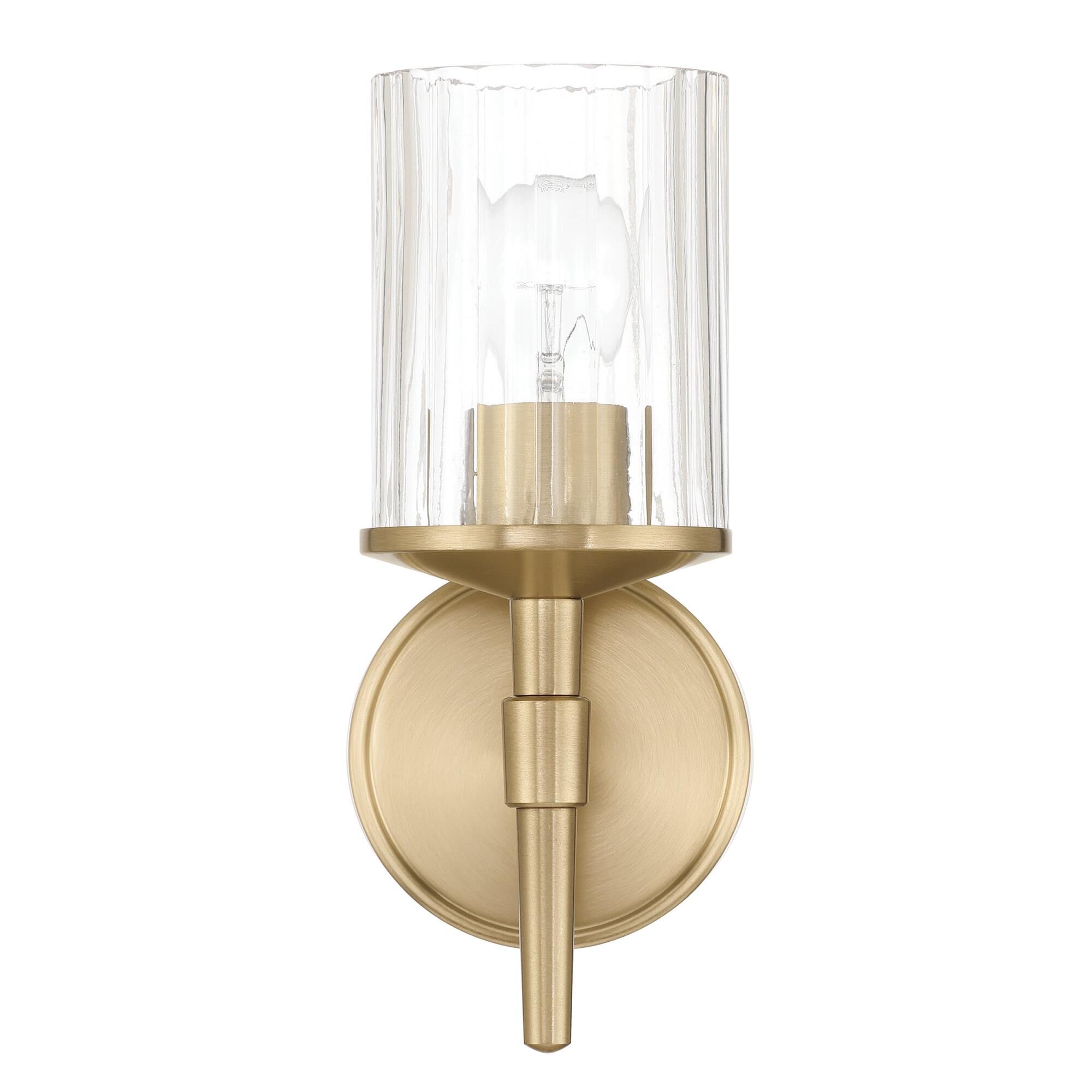 Shown in Champagne Gold finish and Clear Ribbed glass