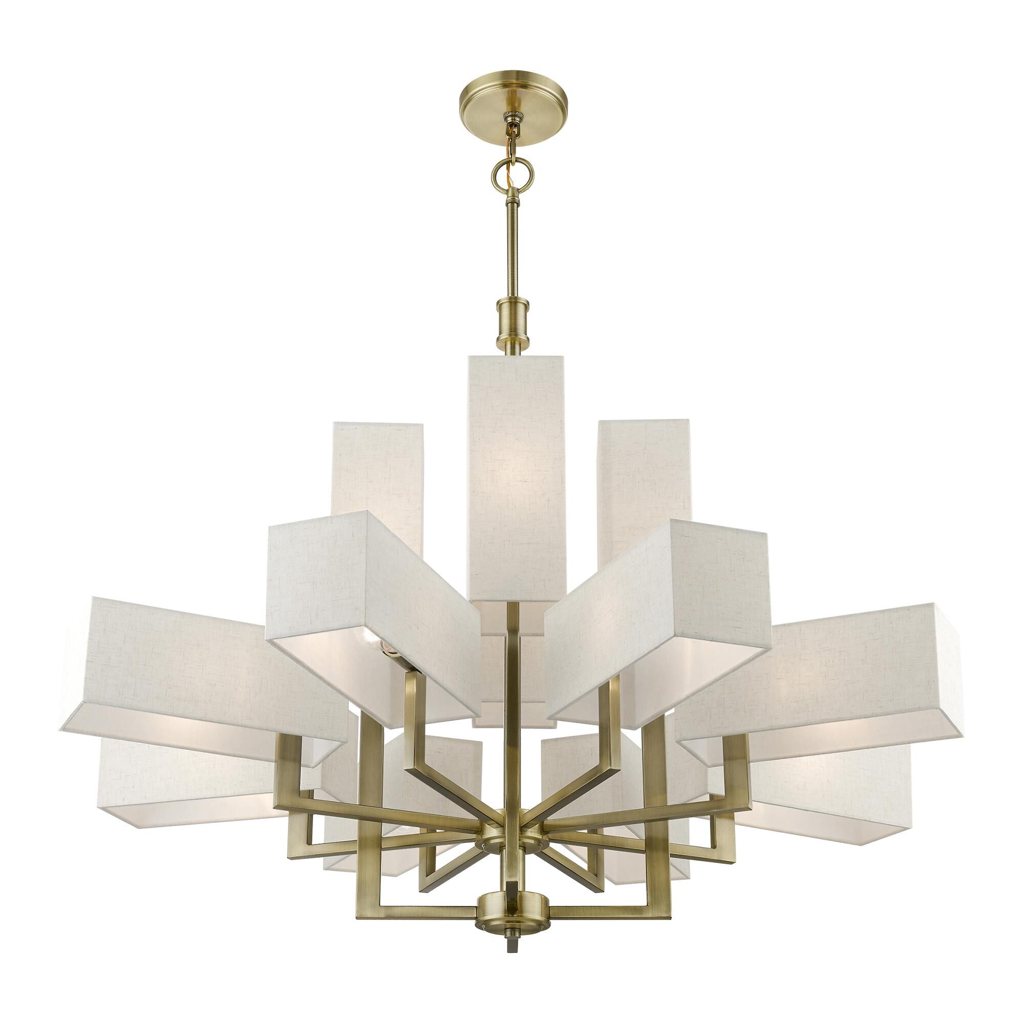 Shown in Antique Brass finish and Hand Crafted Oatmeal Color Hardback Fabric With White Fabric Inside shade