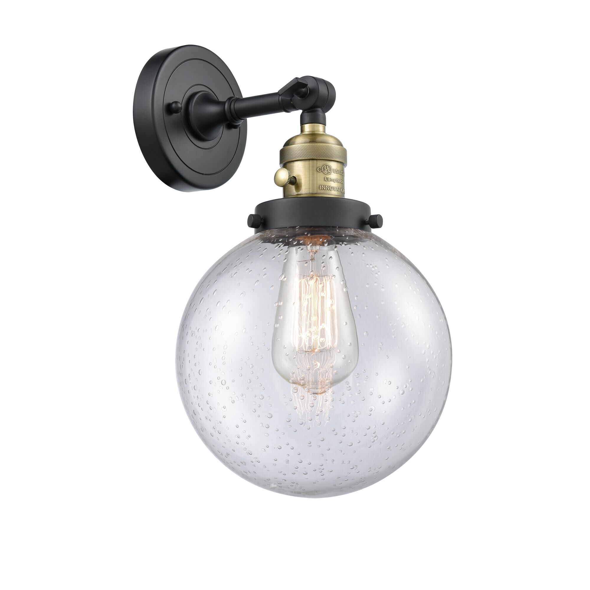 Shown in Black Antique Brass finish and Seedy glass