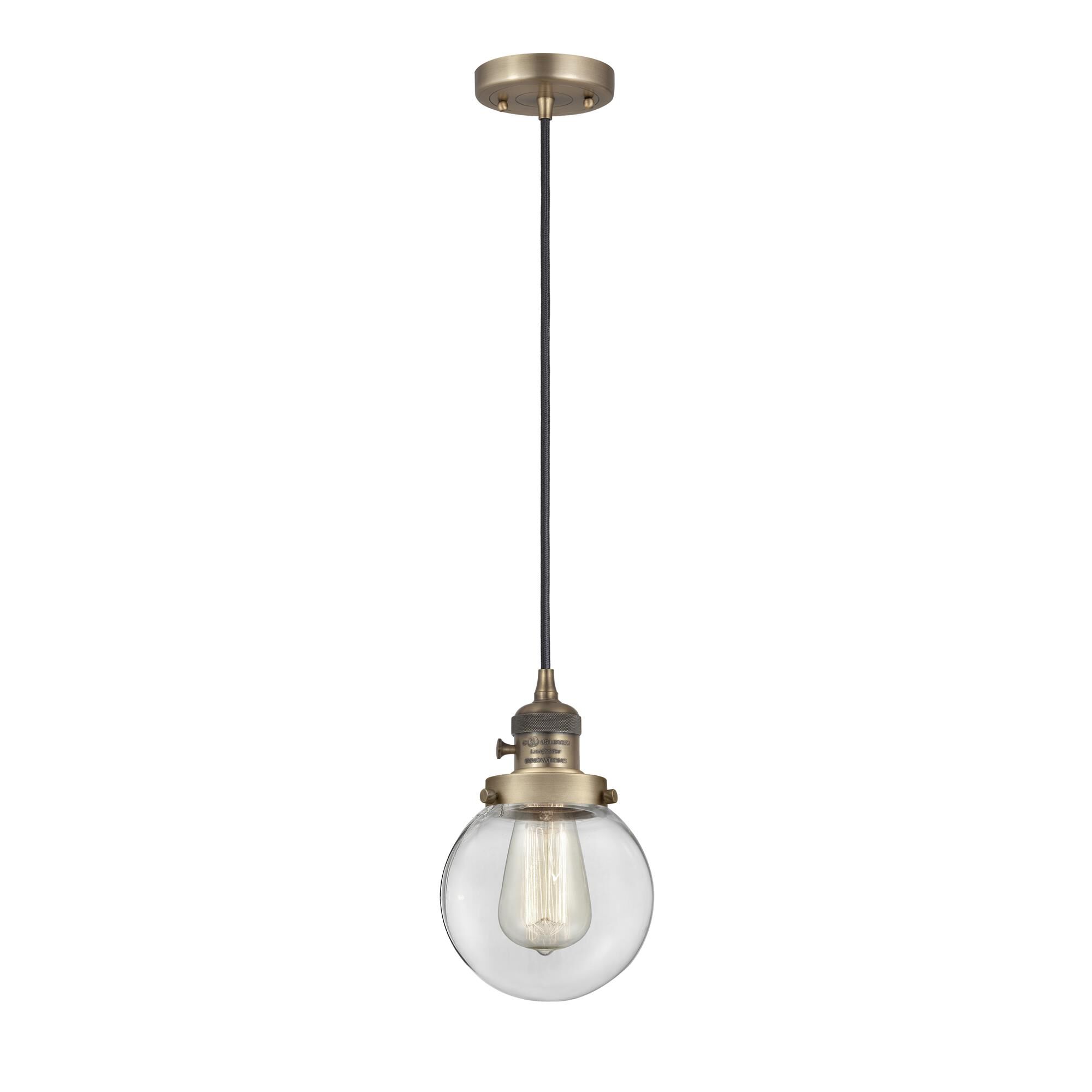 Shown in Brushed Brass finish and Clear glass