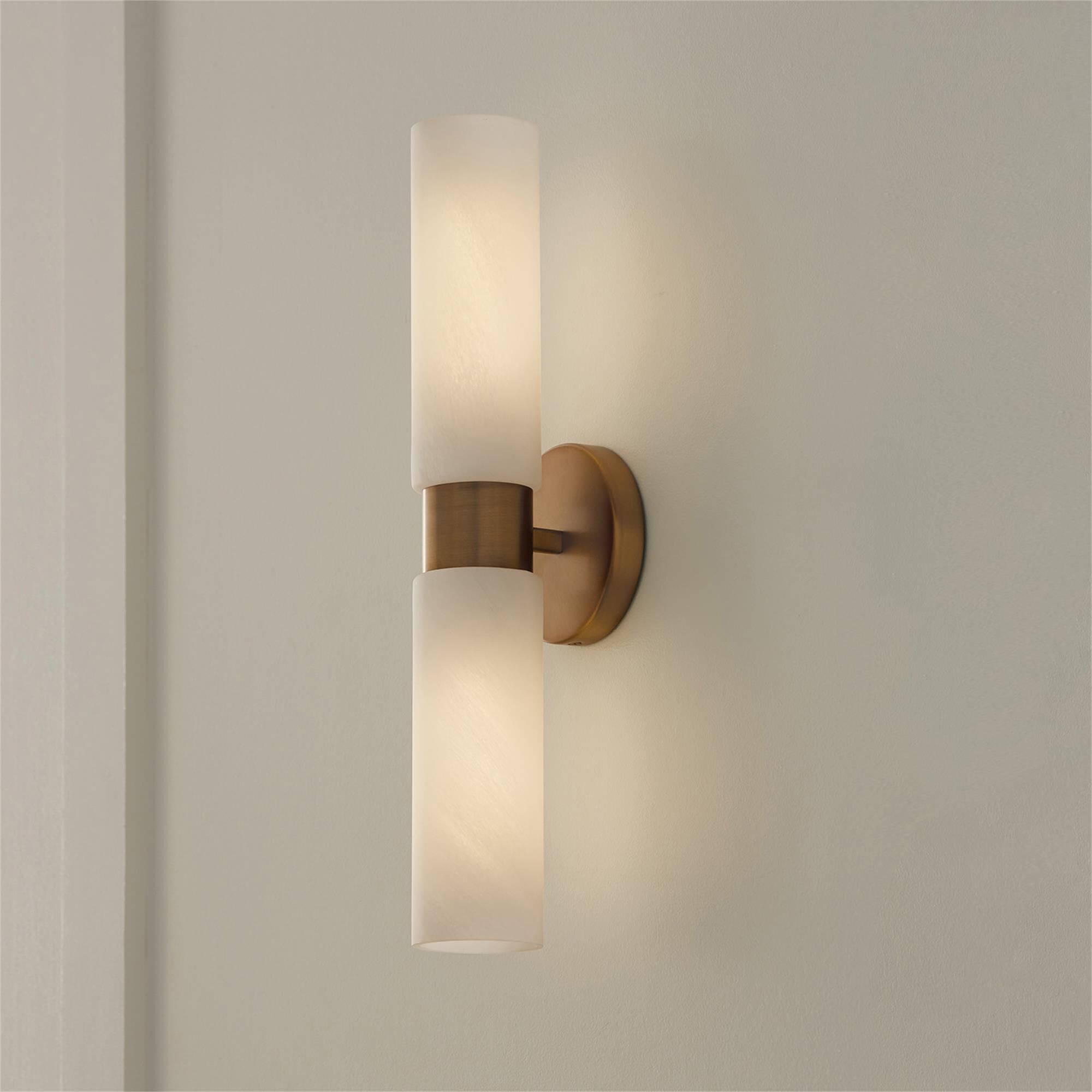 Shown in Aged Brass finish and Faux Alabaster glass