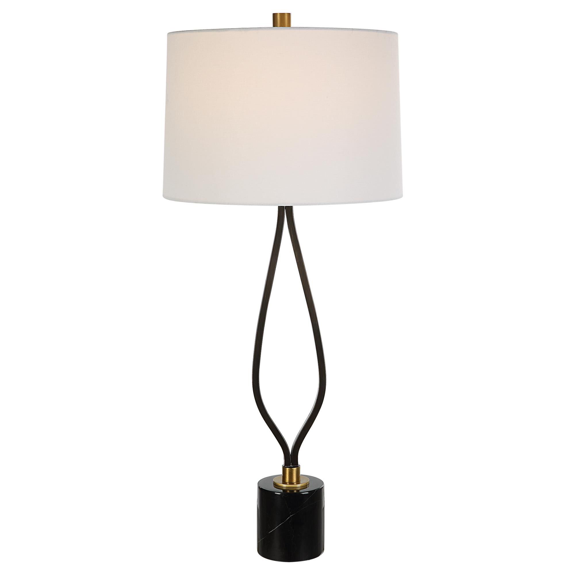 Shown in Antiqued Brass finish and Round Hardback shade