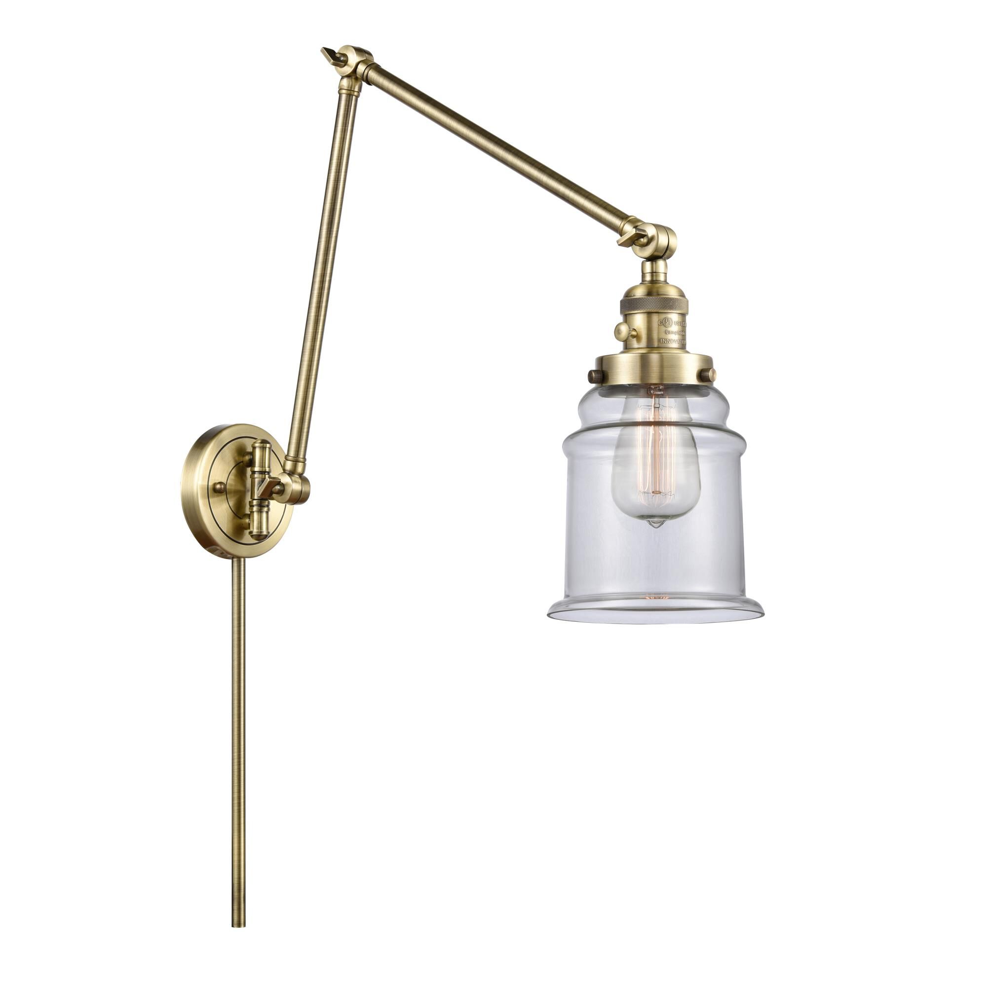 Shown in Antique Brass finish and Clear Canton glass