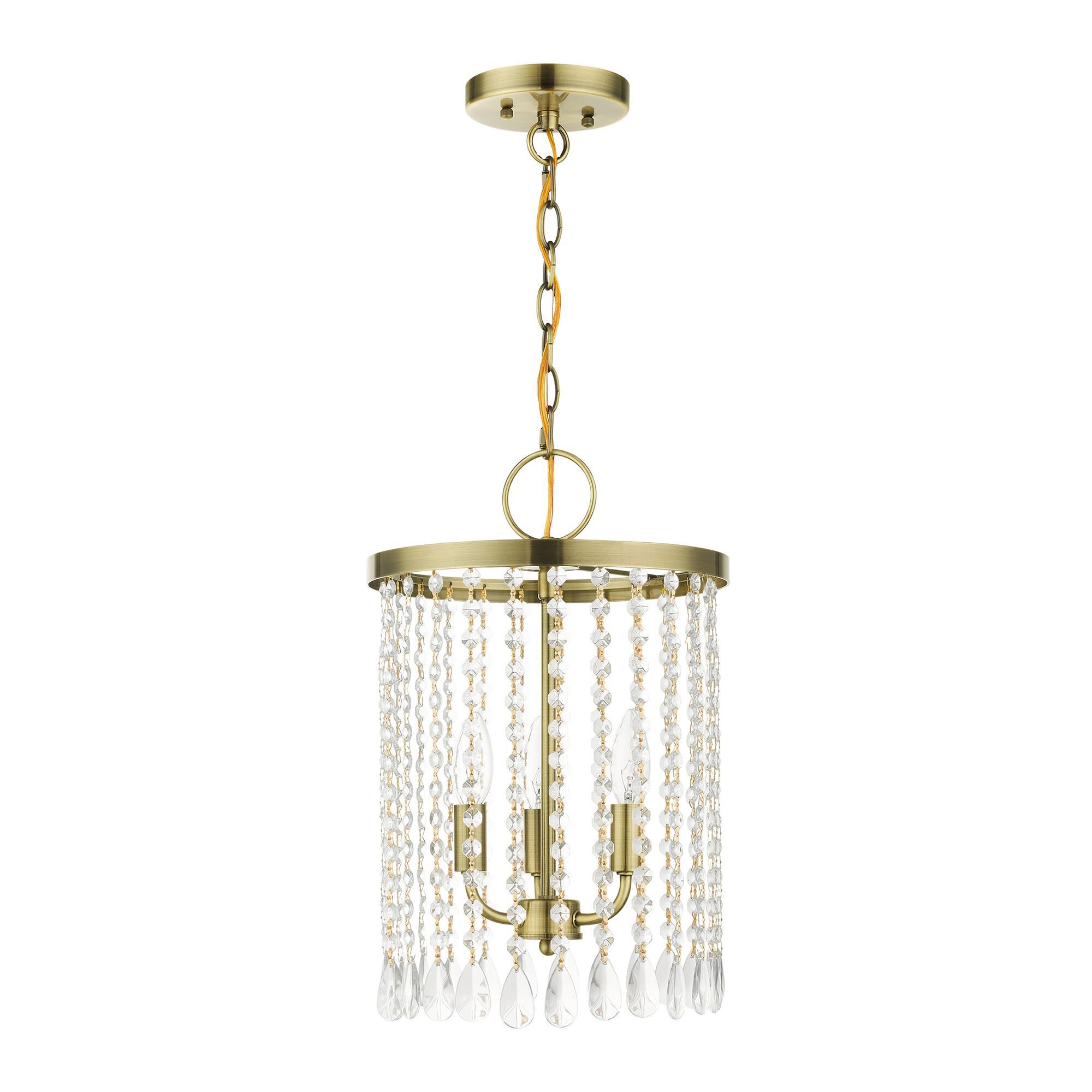 Shown in Antique Brass finish and Hand Assembled Crystal Shade glass