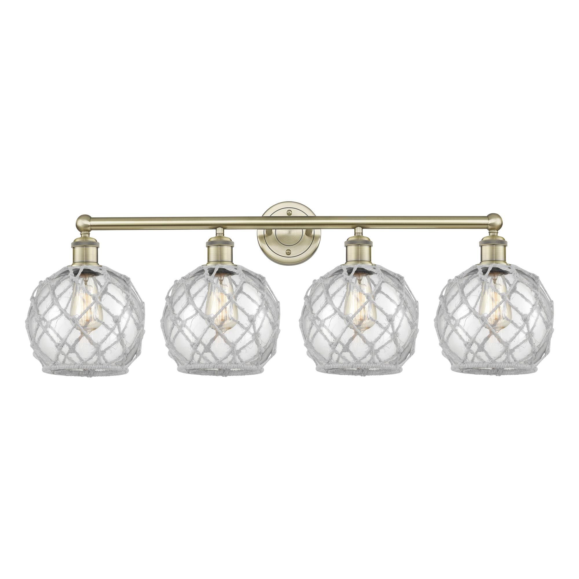 Shown in Antique Brass finish and Clear with White Rope glass