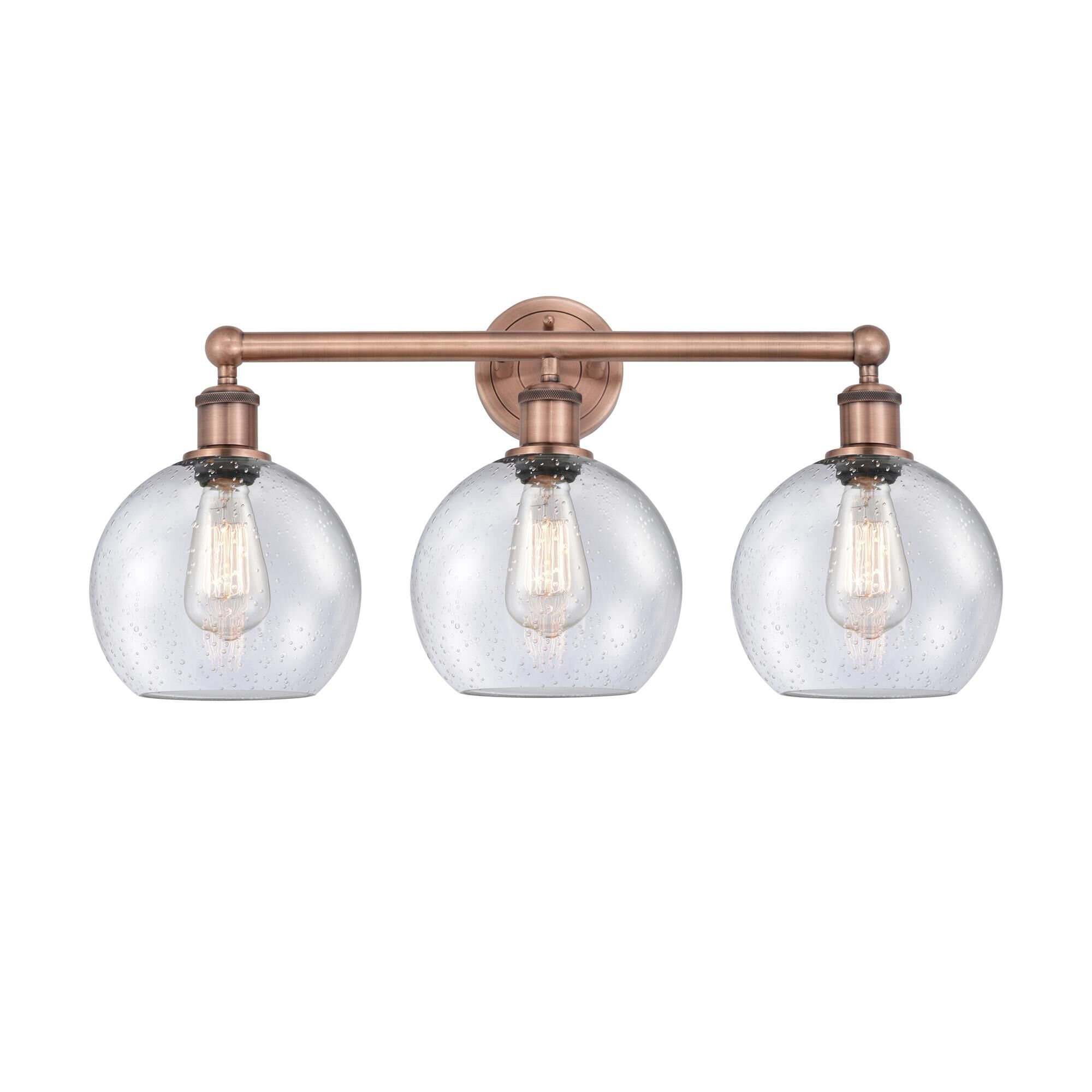 Shown in Antique Copper finish and Seedy glass