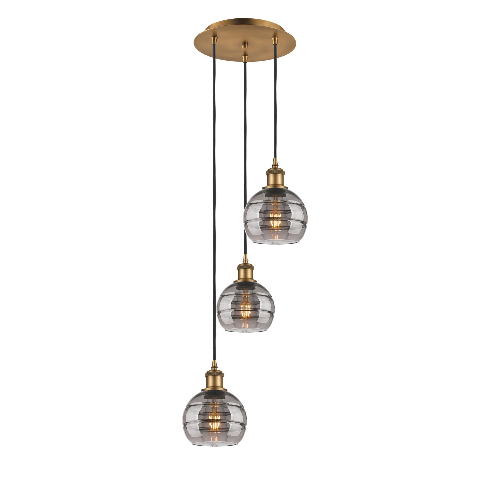 Shown in Brushed Brass finish and Light Smoke glass