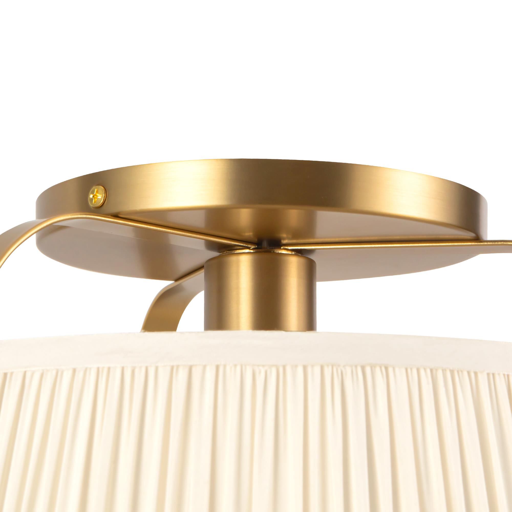 Shown in Brushed Gold finish and Frosted Polycarbonate Diffuser glass and White Linen shade