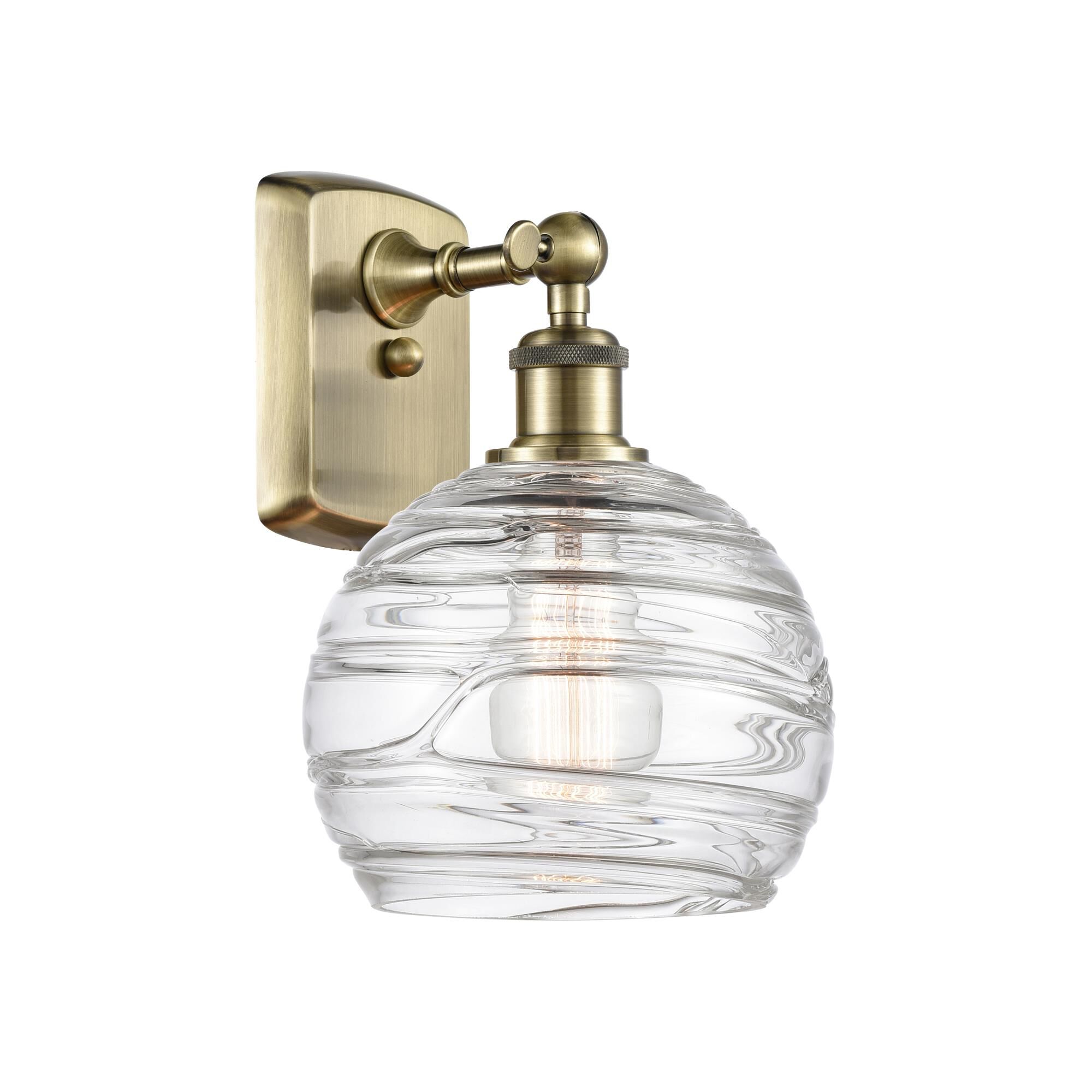 Shown in Antique Brass finish and Sphere glass and Glass shade