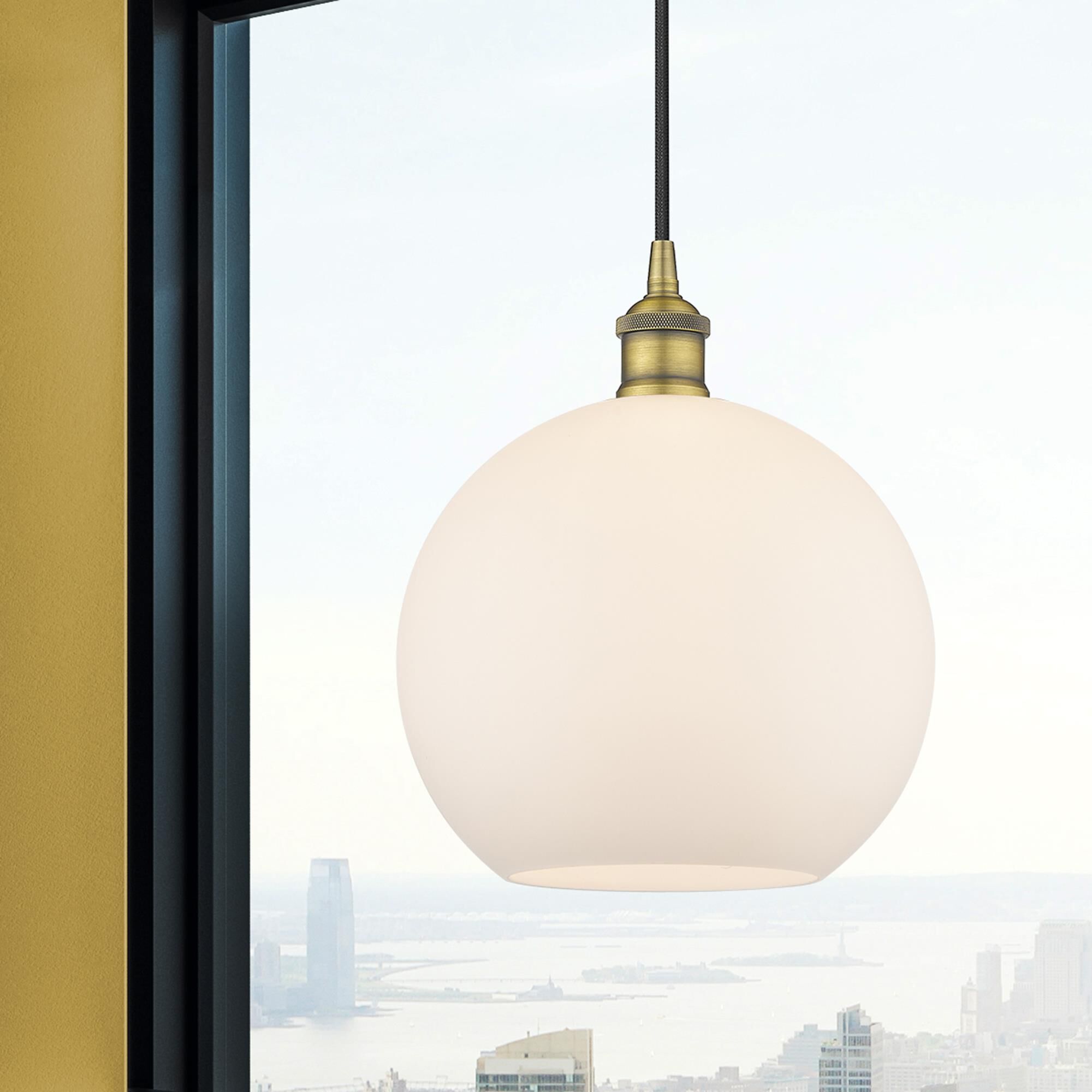 Shown in Brushed Brass finish and Cased Matte White Large Athens glass