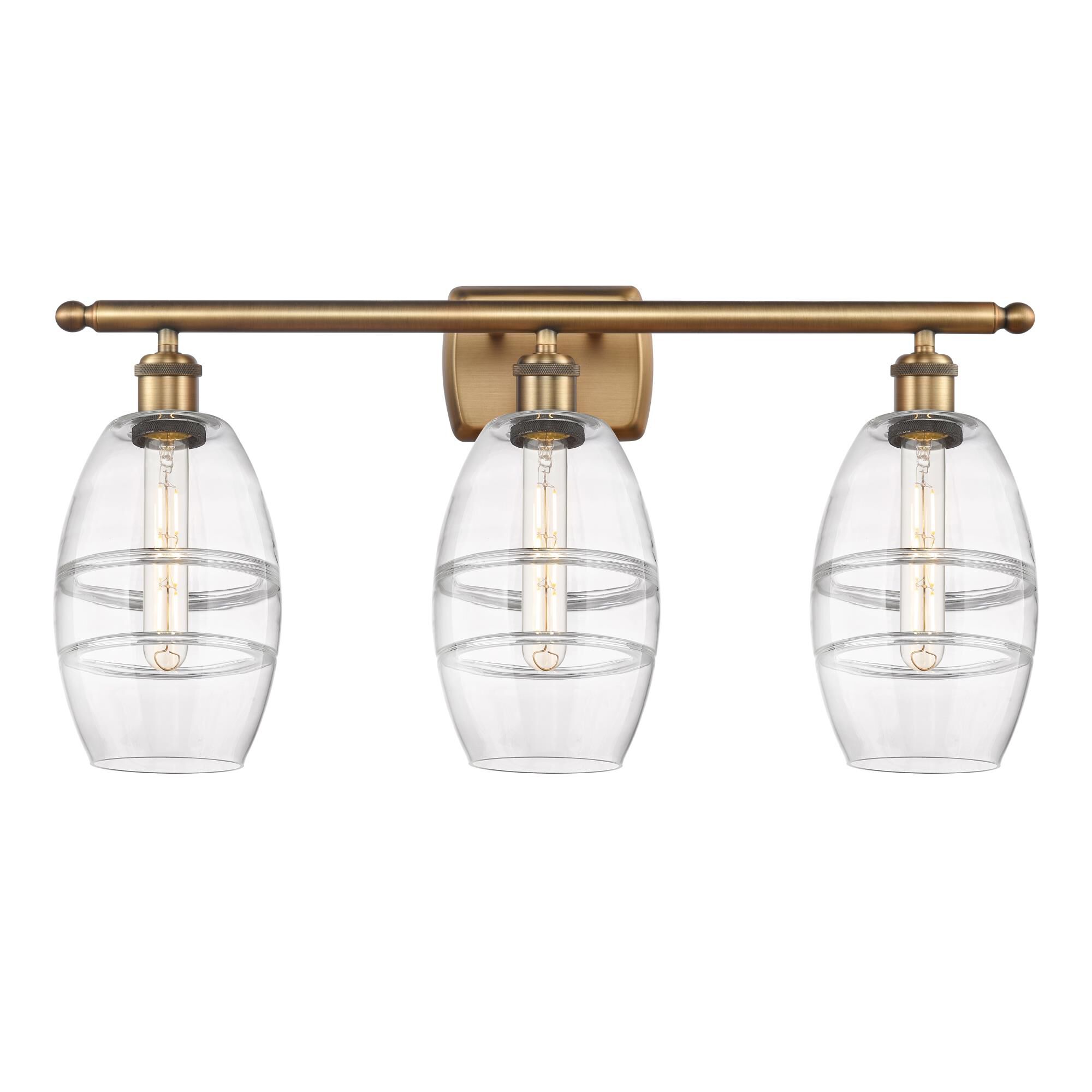 Shown in Brushed Brass finish and Clear glass