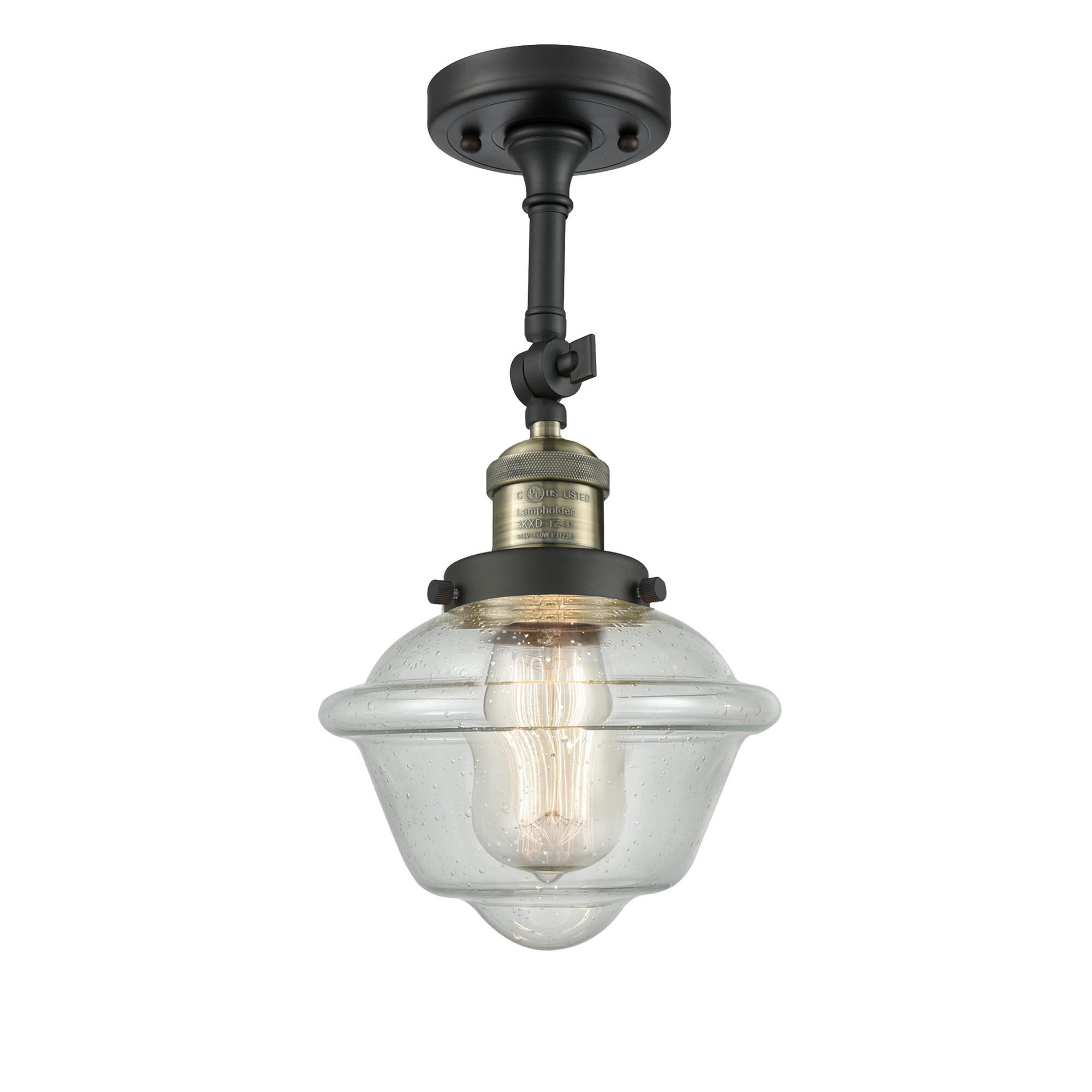 Shown in Black Antique Brass finish and Seedy glass
