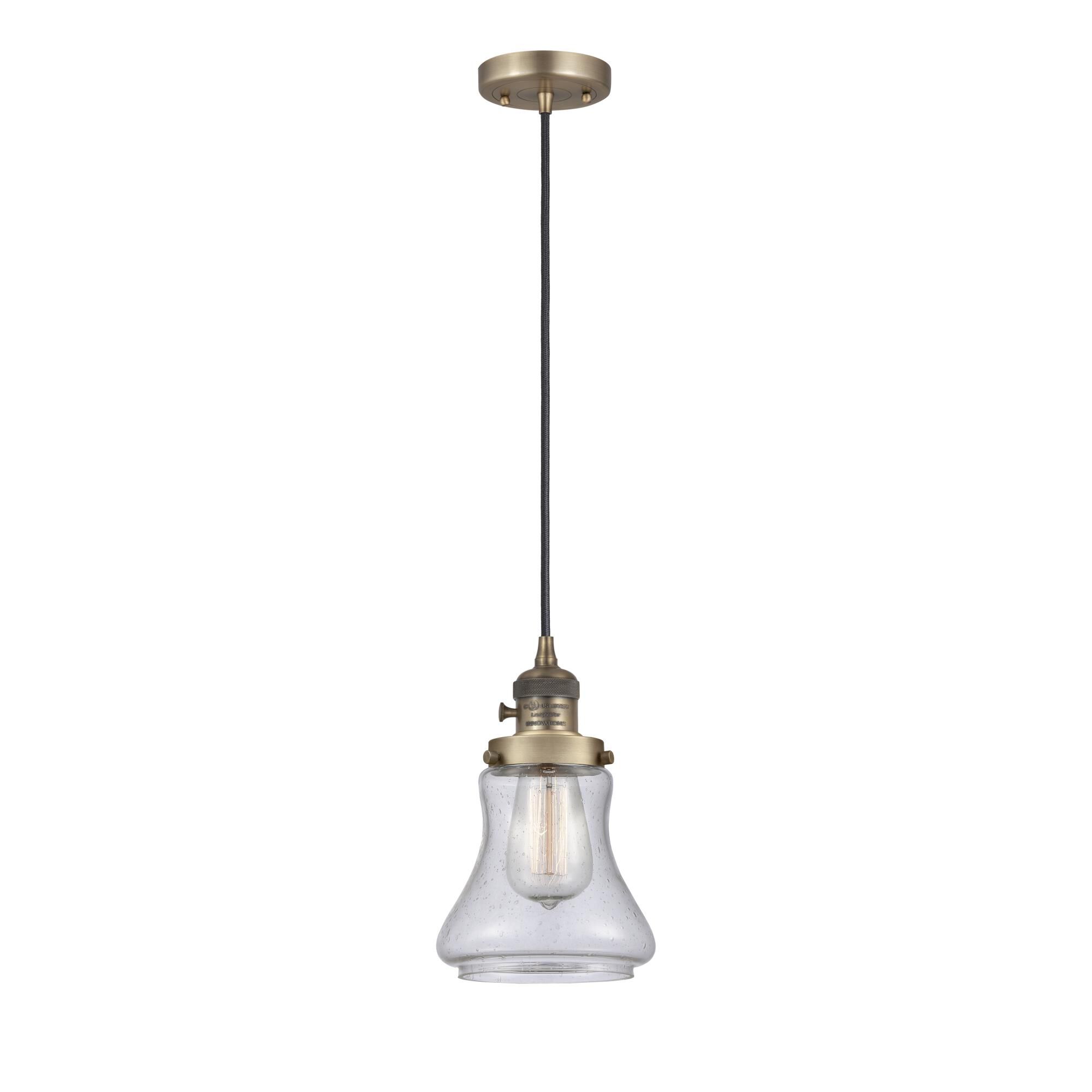 Shown in Brushed Brass finish and Seedy glass