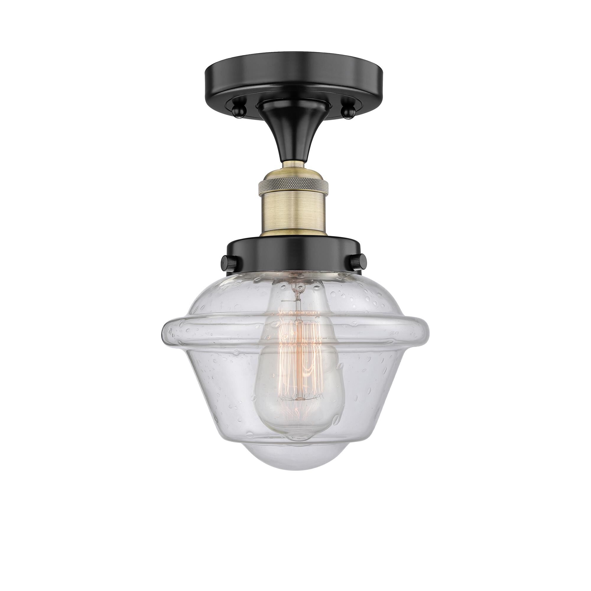 Shown in Black Antique Brass finish and Seedy glass