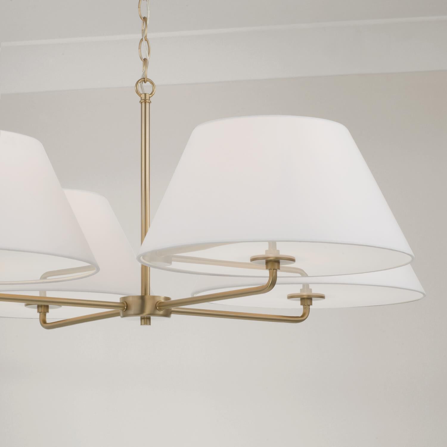 Shown in Matte Brass finish and Soft White Fabric Stay-Straight shade