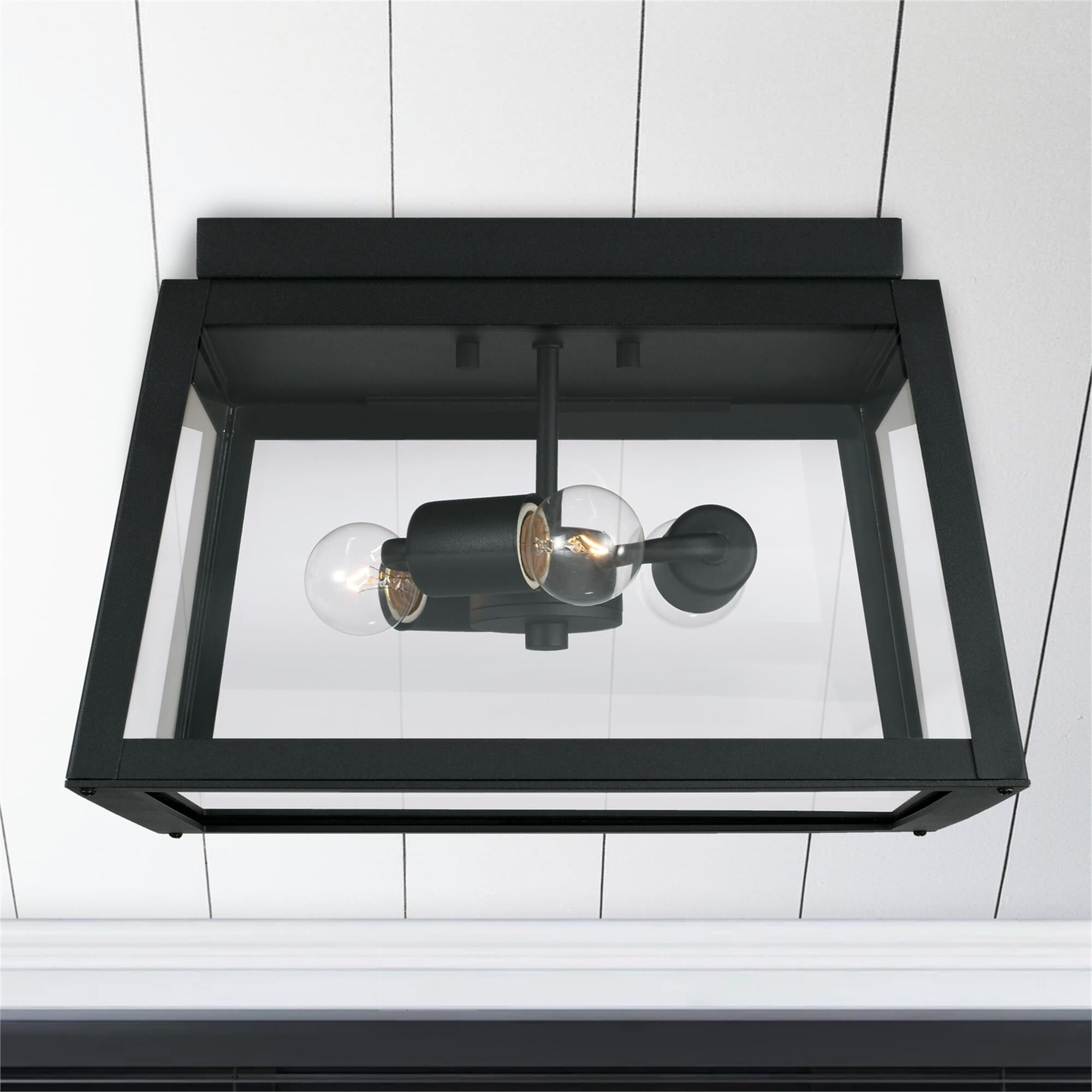 Shown in Black finish and Clear glass