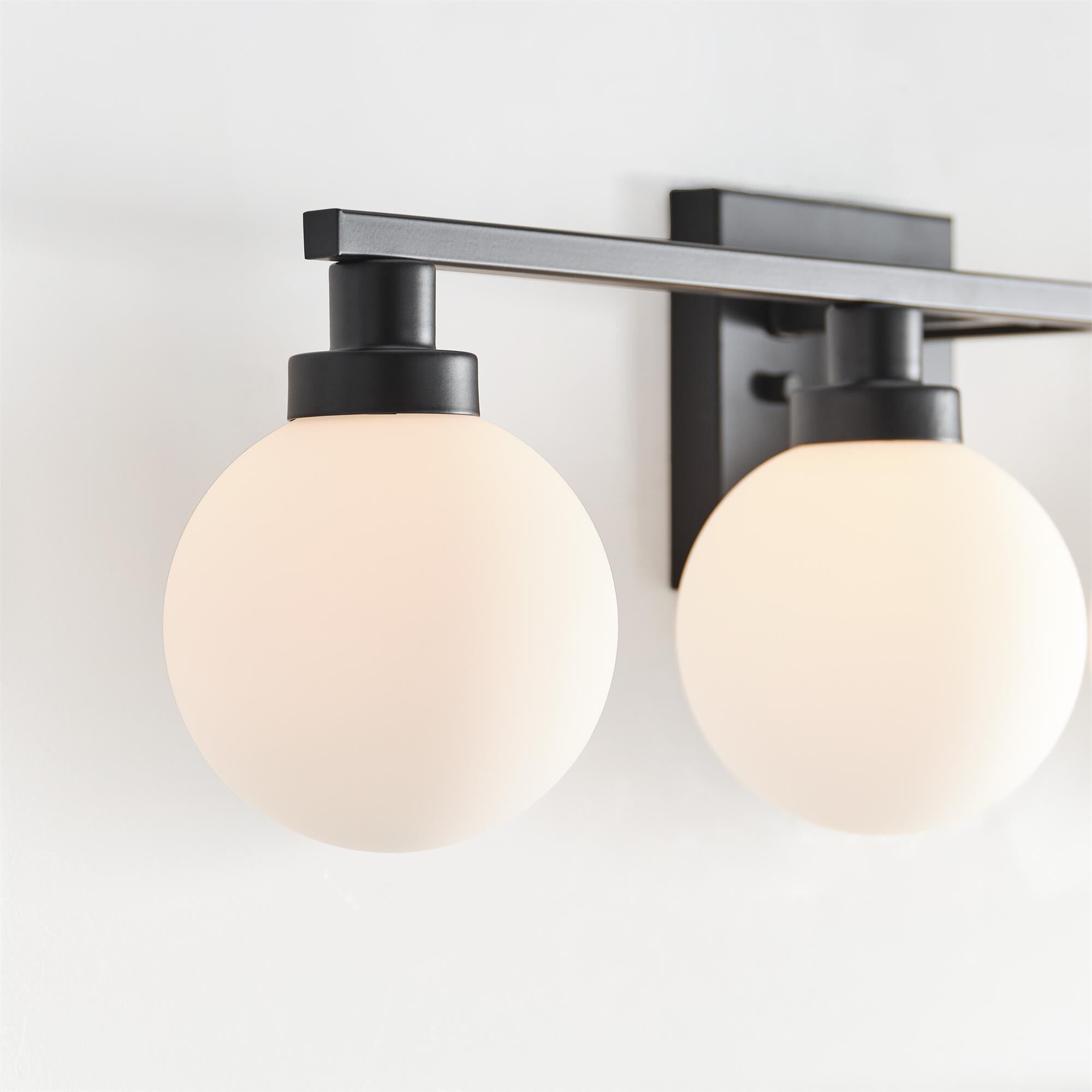 Shown in Midnight Black finish and Milk glass
