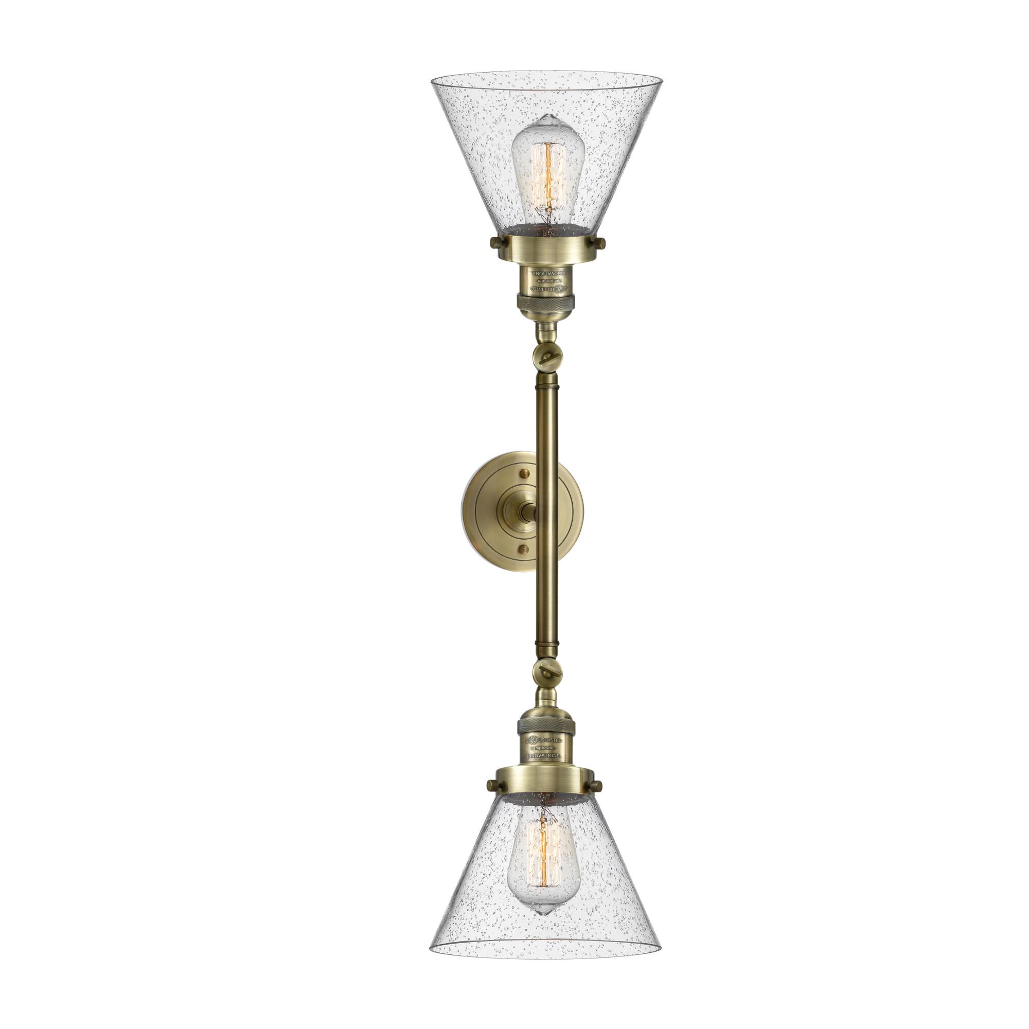 Shown in Antique Brass finish and Seedy glass