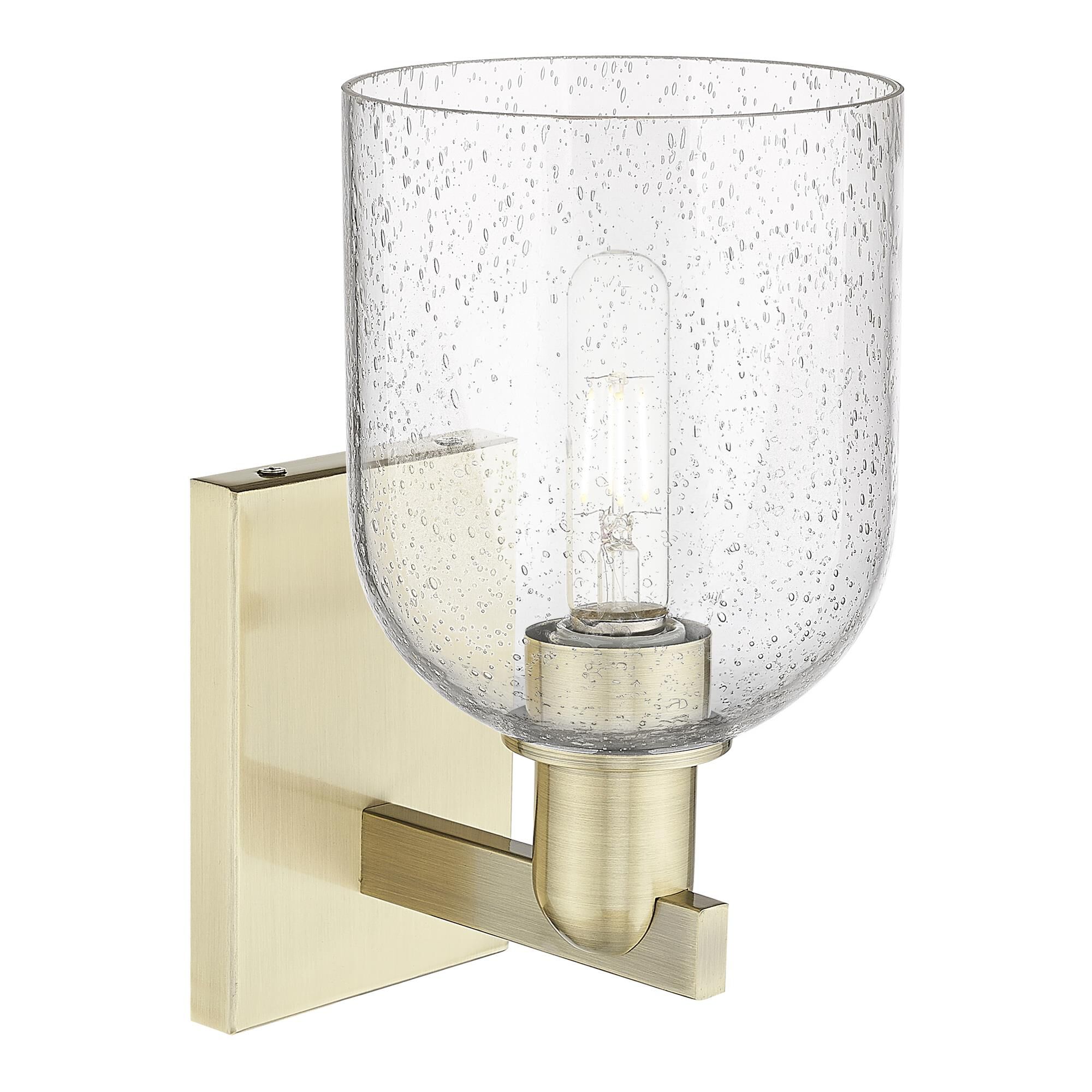 Shown in Antique Brass finish and Seedy glass