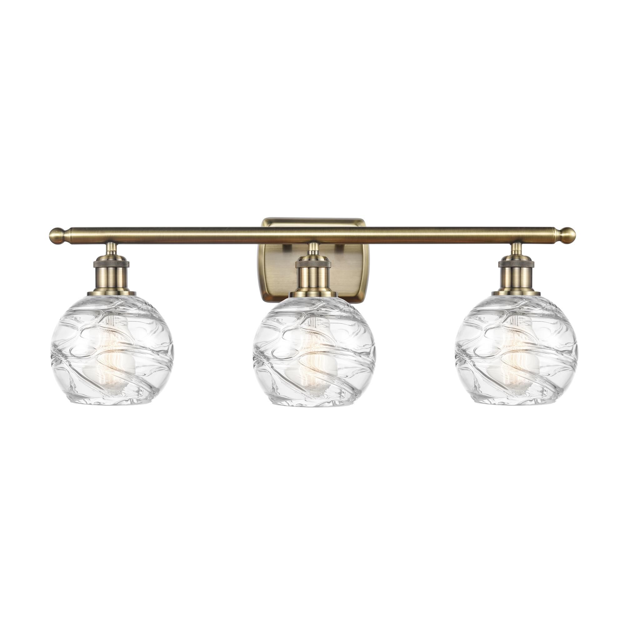Shown in Antique Brass finish and Sphere glass and Glass shade