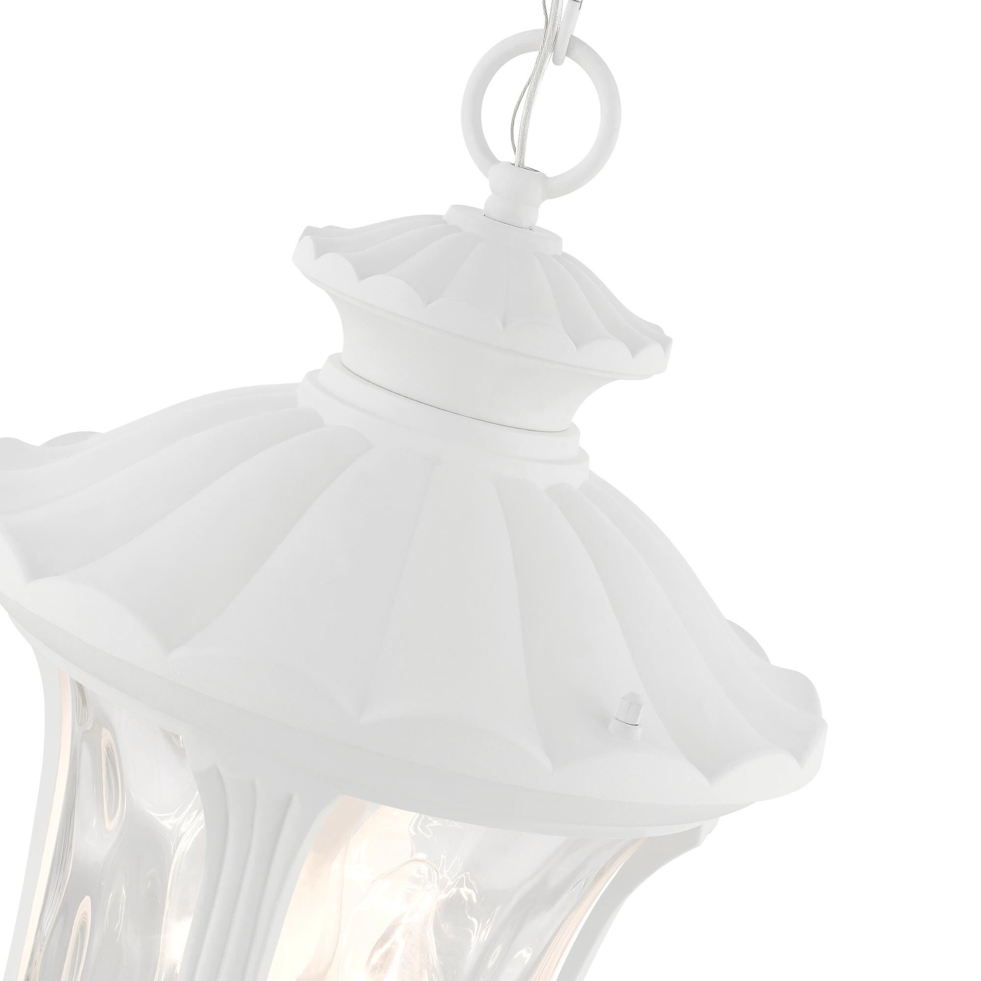 Shown in Textured White finish and Hand Blown Clear Water glass and Hand Blown Clear Water Glass shade