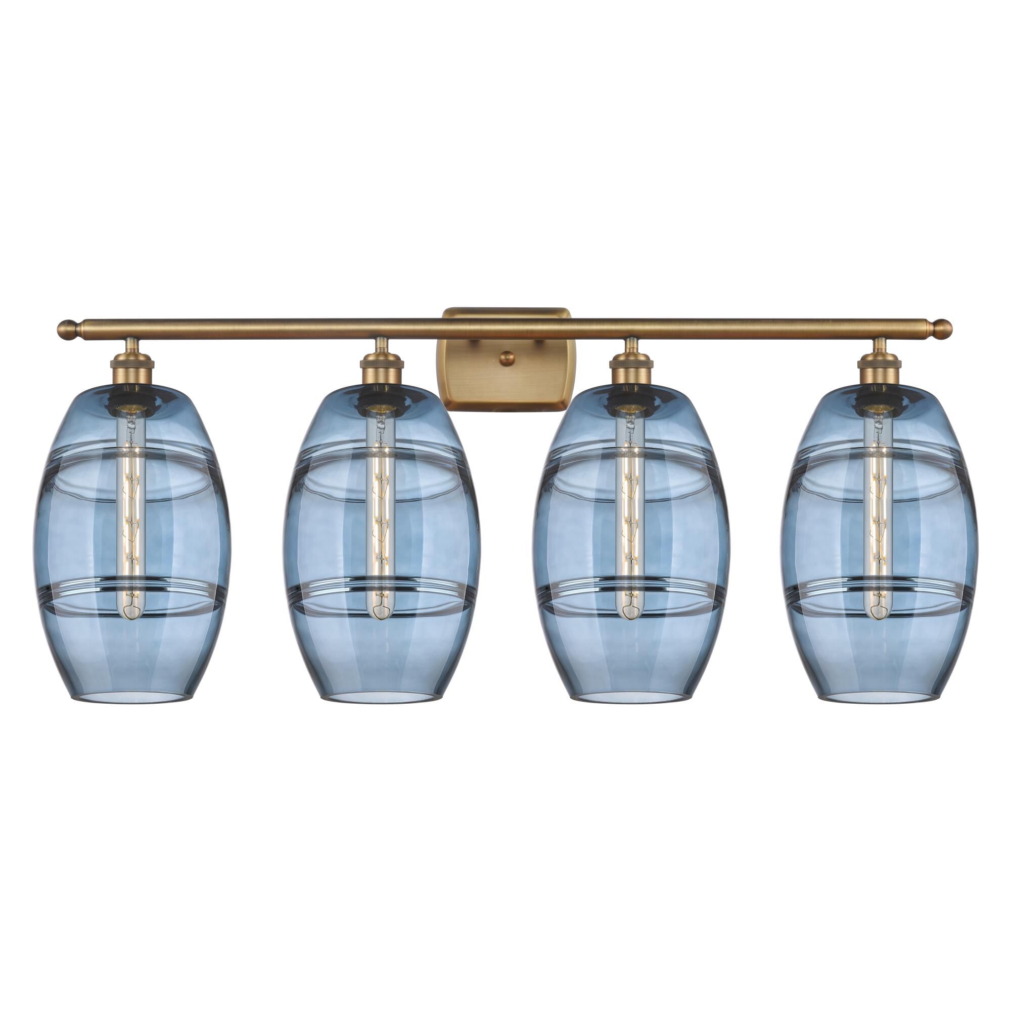 Shown in Brushed Brass finish and Princess Blue glass