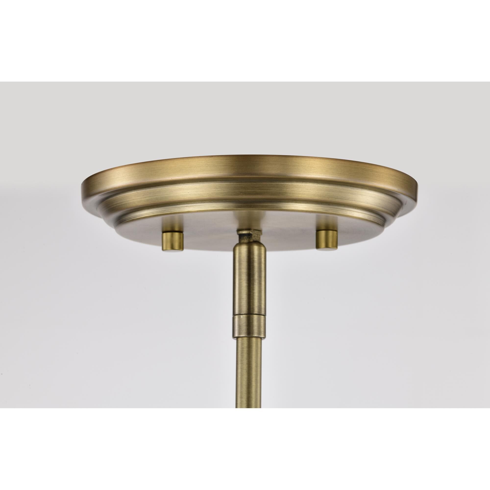 Shown in Vintage Brass finish and Etched White Opal glass and Etched Opal shade