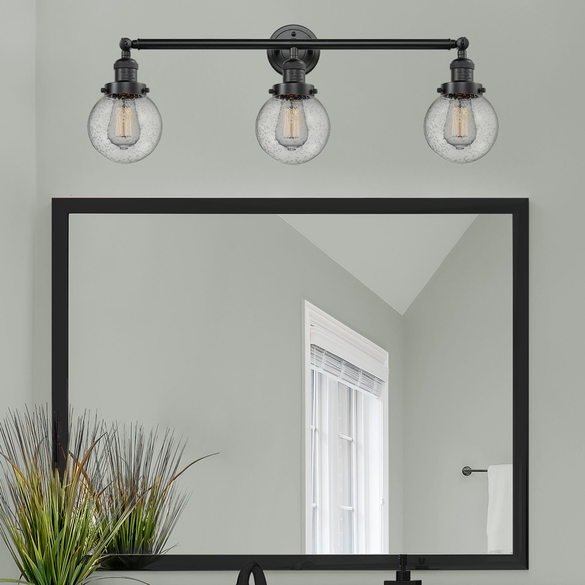 Shown in Oil Rubbed Bronze finish and Seedy Beacon glass