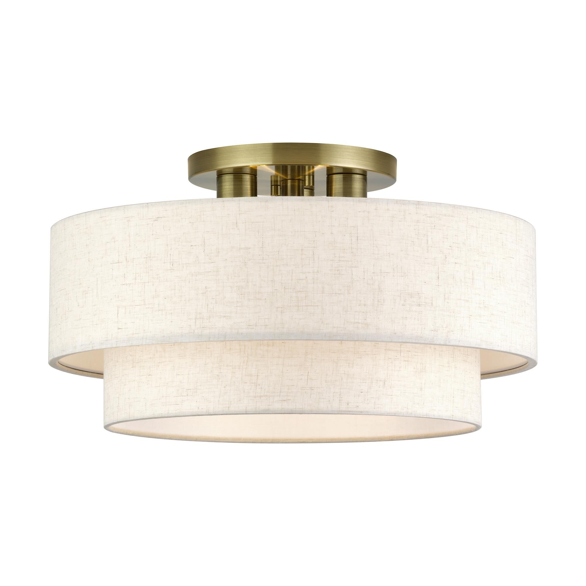 Shown in Antique Brass finish and Hand Crafted Oatmeal Color Fabric with White Color Inside shade