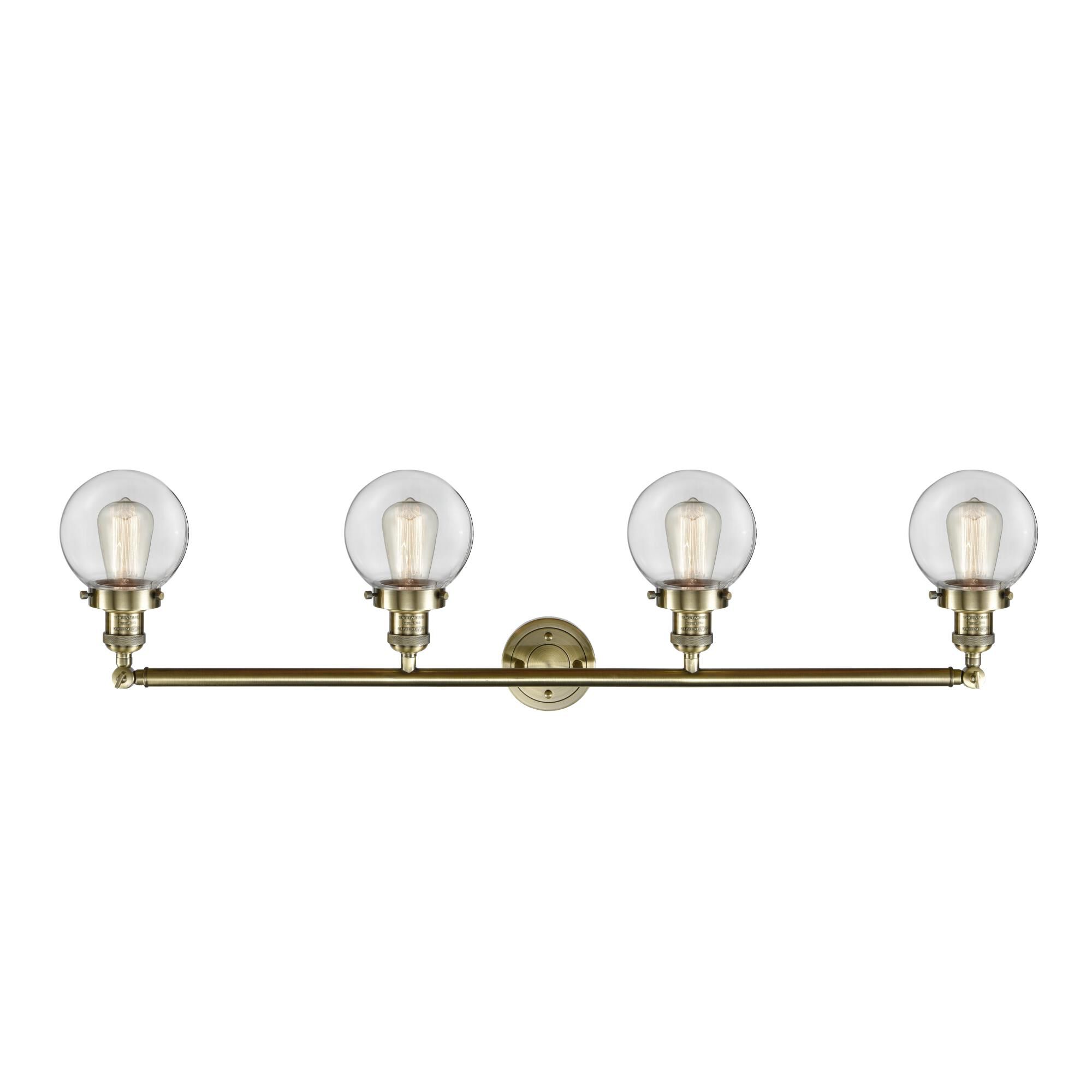 Shown in Antique Brass finish and Clear Beacon glass